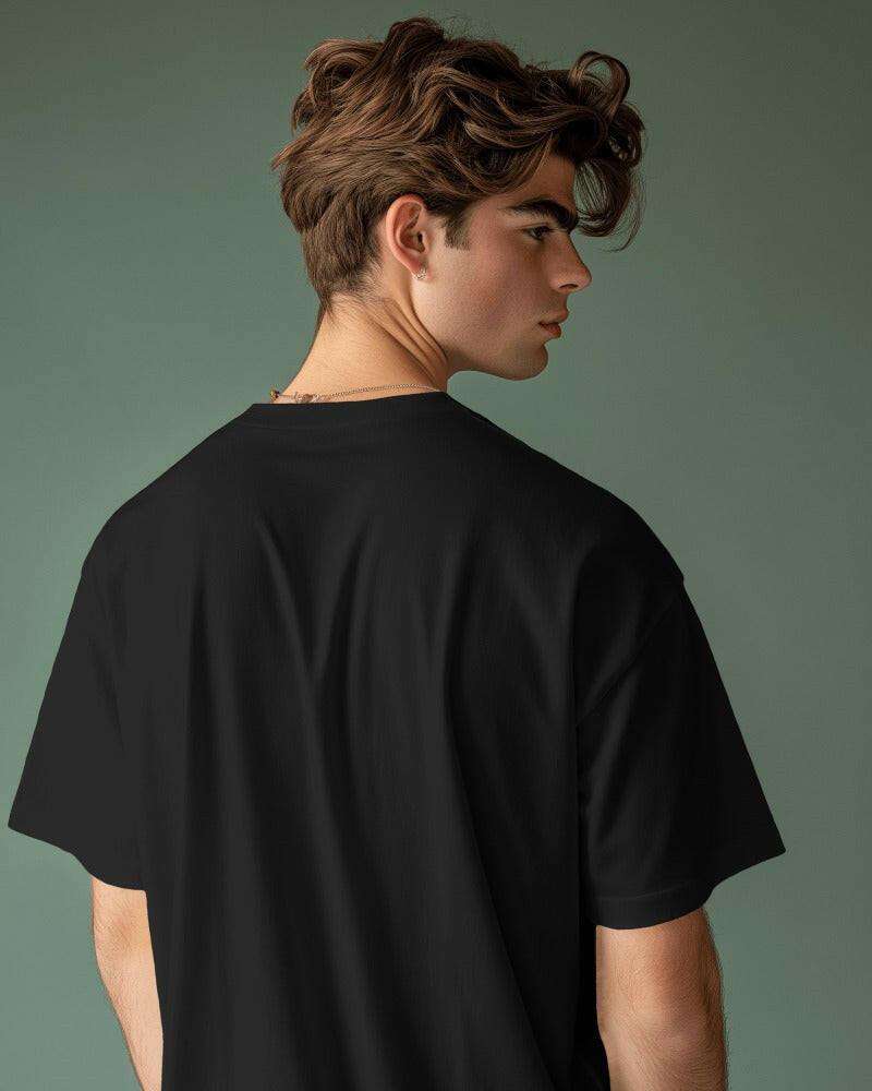 An oversized, solid basic Black tee from Nitorious Atelier, offering comfort and style in equal measure.
