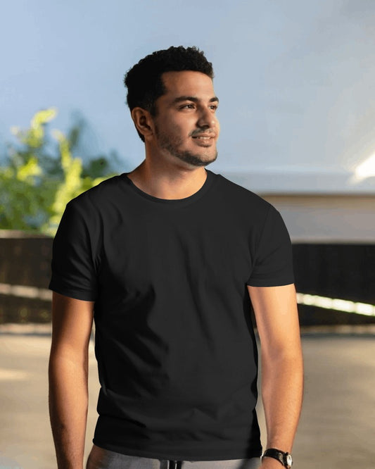 Black regular fit t-shirt from Nitorious Atelier. Made from premium cotton, this t-shirt offers a sleek and comfortable fit. Ideal for versatile styling, it's a wardrobe essential that provides both durability and a classic look