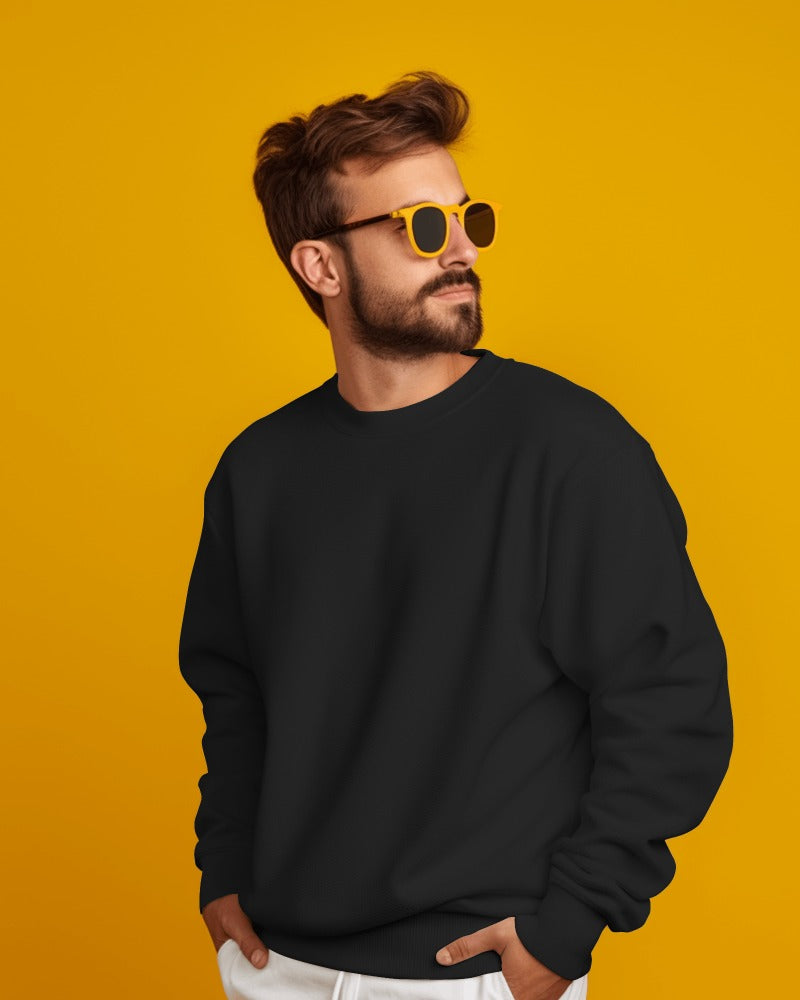 Black heavy gauge sweatshirt from Nitorious Atelier, made from high-quality fabric for exceptional warmth and durability. This sweatshirt features a relaxed fit with ribbed cuffs and hem, ideal for casual wear or layering, offering a sleek and modern aesthetic.