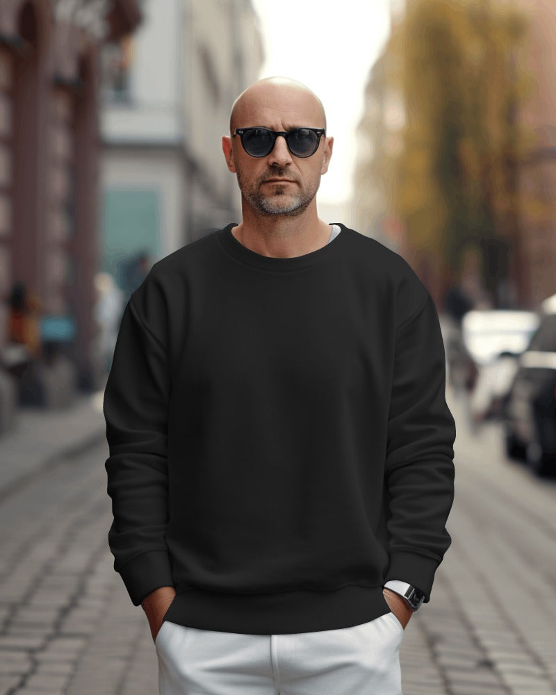 Black heavy gauge sweatshirt from Nitorious Atelier, made from high-quality fabric for exceptional warmth and durability. This sweatshirt features a relaxed fit with ribbed cuffs and hem, ideal for casual wear or layering, offering a sleek and modern aesthetic.