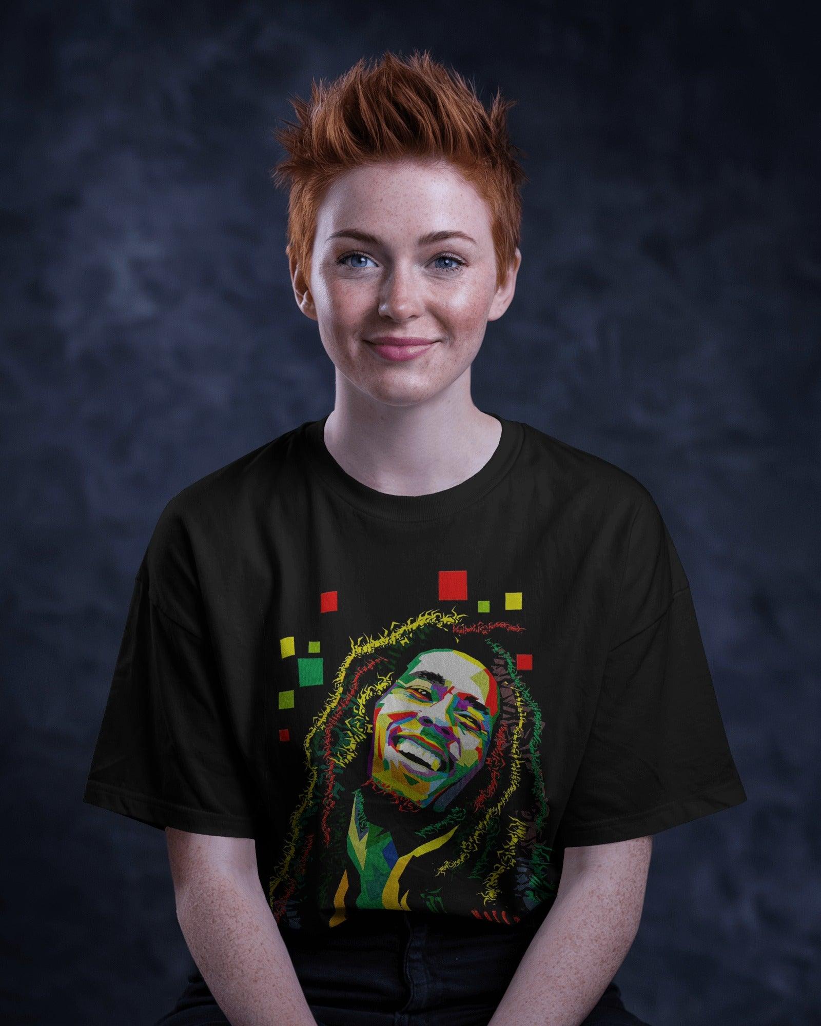 Black graphic t-shirt featuring a vibrant Bob Marley print. Made from premium cotton, this t-shirt offers a soft feel, durability, and a stylish tribute to the reggae legend.