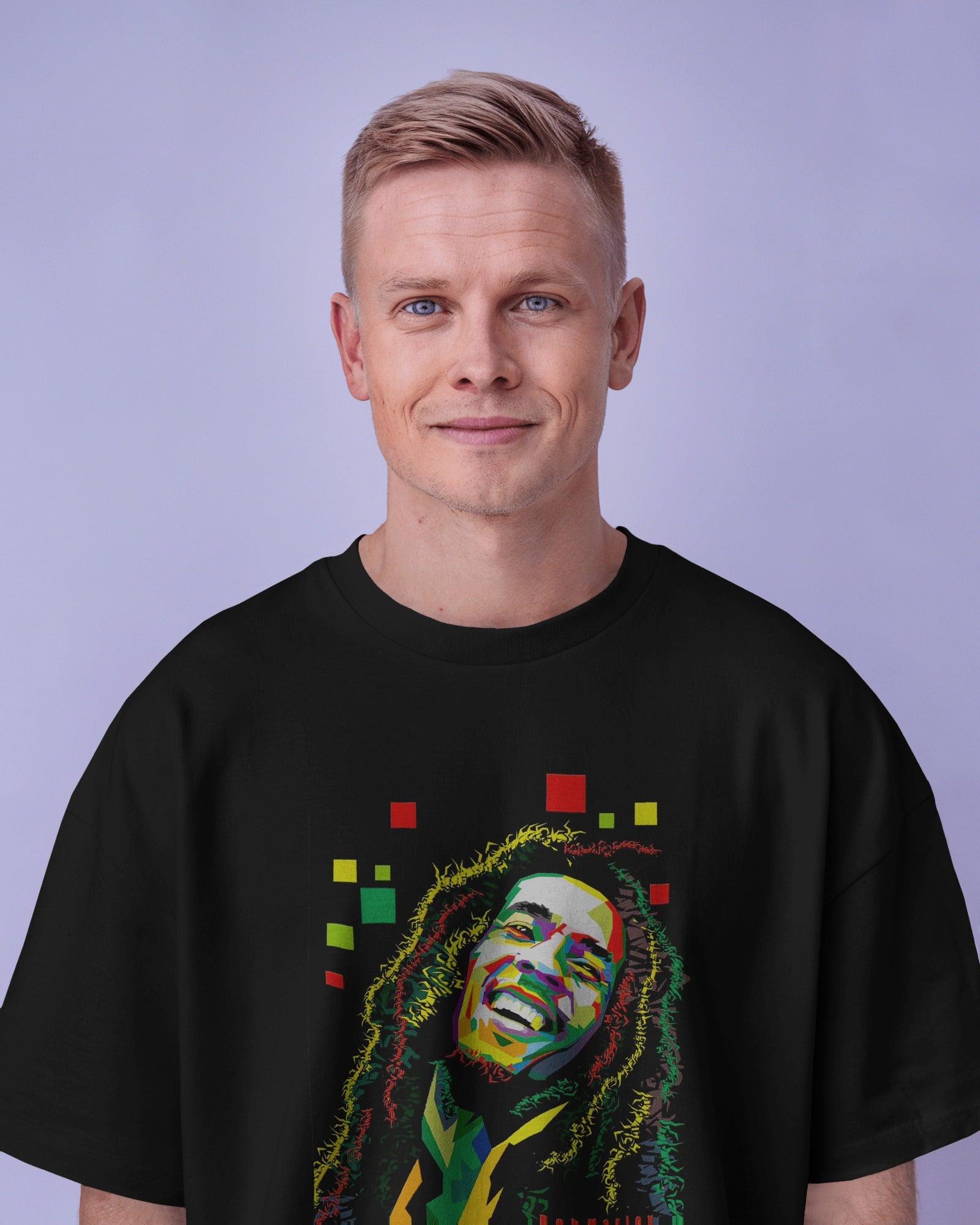Black graphic t-shirt featuring a vibrant Bob Marley print. Made from premium cotton, this t-shirt offers a soft feel, durability, and a stylish tribute to the reggae legend.