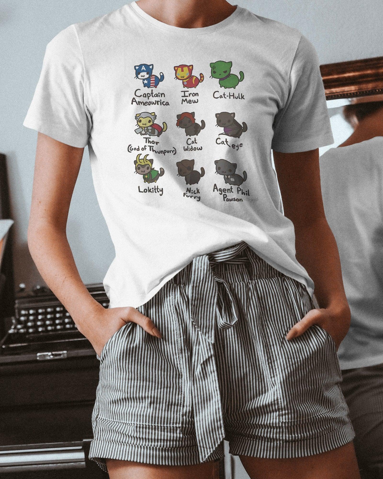 Rasha Thadani wearing the White Regular Fit Cat Avengers Assemble T-shirt from Nitorious Atelier. This premium cotton tee showcases a playful crossover design of cats as iconic superheroes, offering both style and comfort.