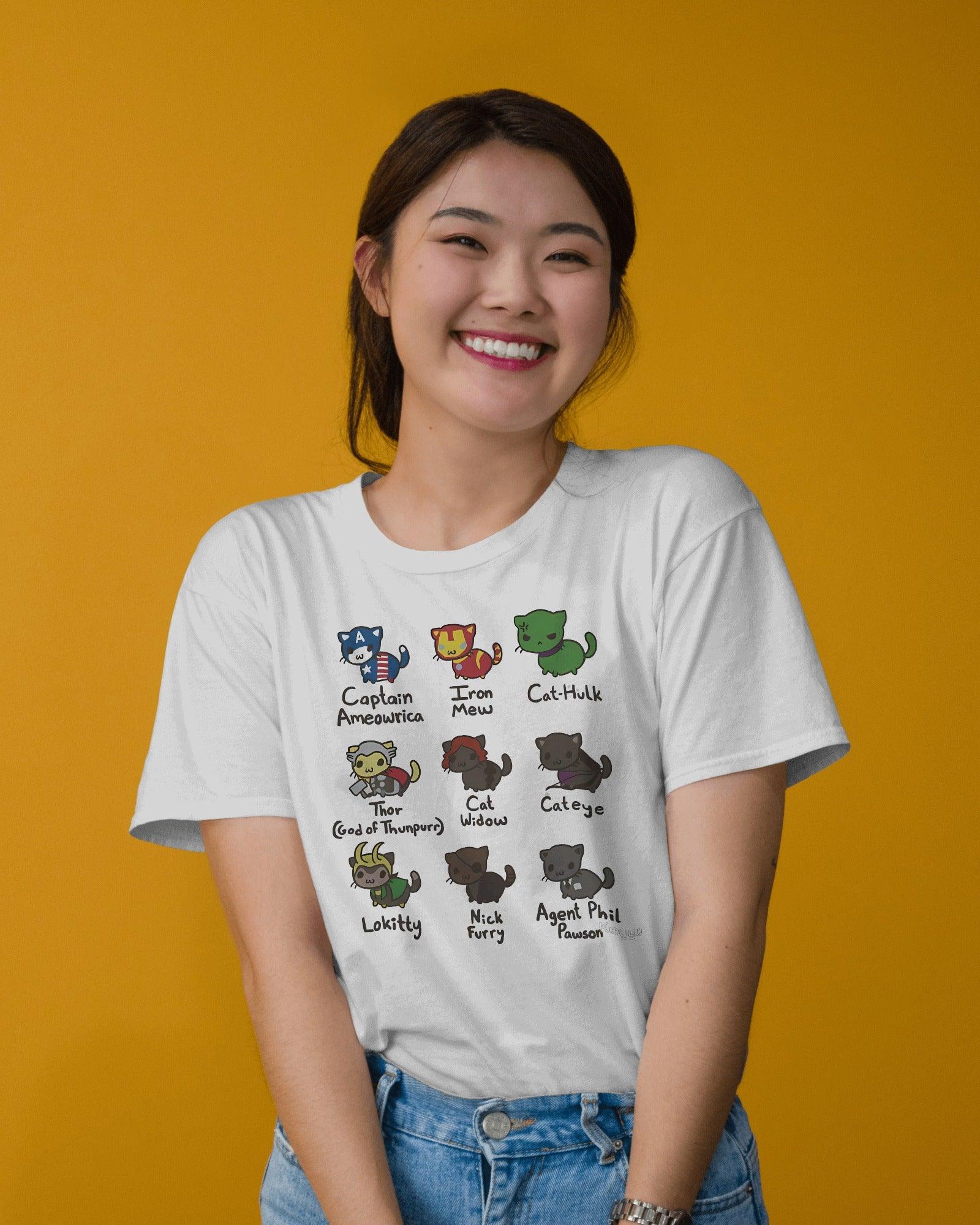 Rasha Thadani wearing the White Regular Fit Cat Avengers Assemble T-shirt from Nitorious Atelier. This premium cotton tee showcases a playful crossover design of cats as iconic superheroes, offering both style and comfort.