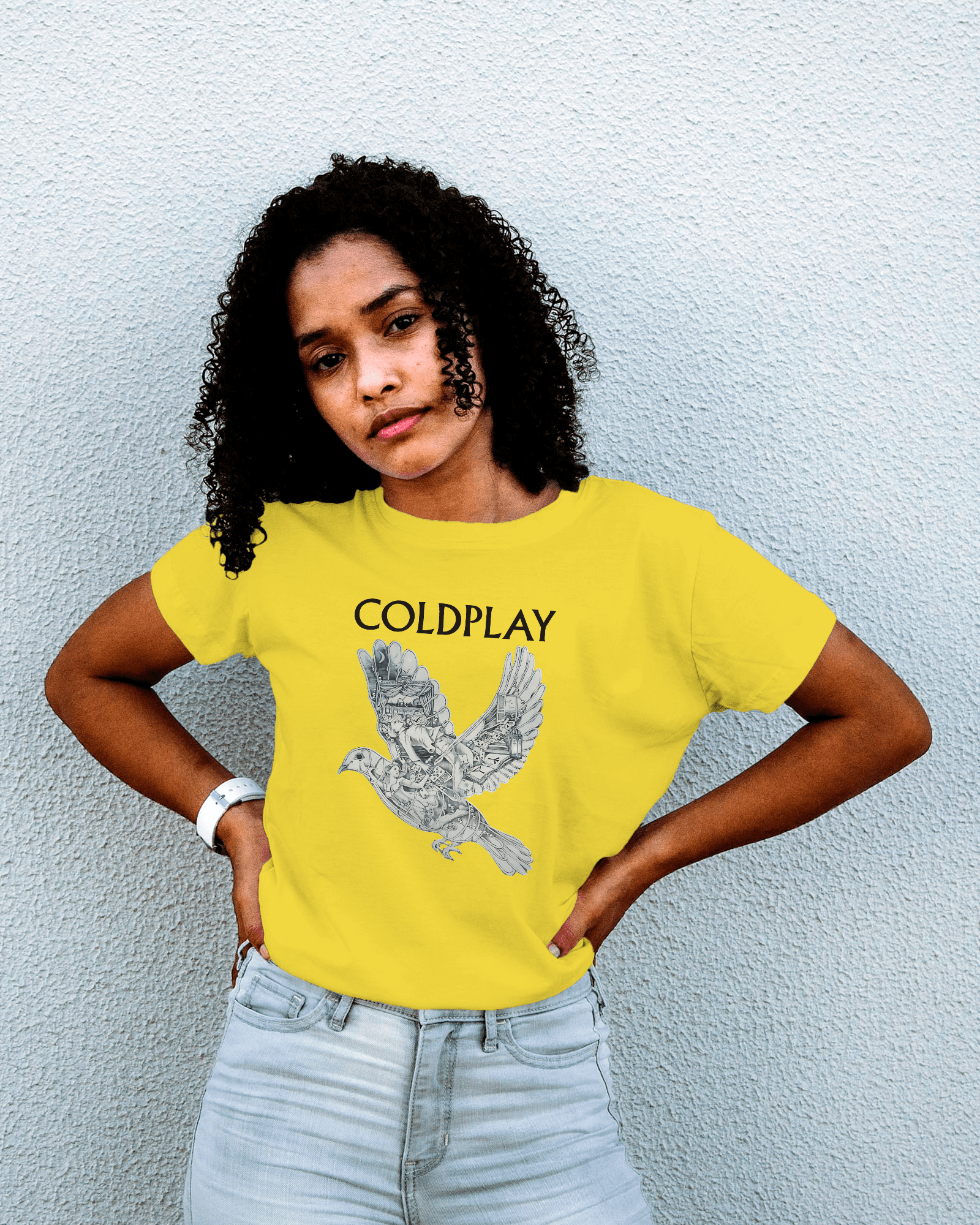 Coldplay Yellow T-shirt by Nitorious Atelier featuring a minimalist design inspired by the iconic song 'Yellow.' Crafted from premium cotton, this t-shirt offers exceptional comfort and durability, perfect for fans and casual wear alike.