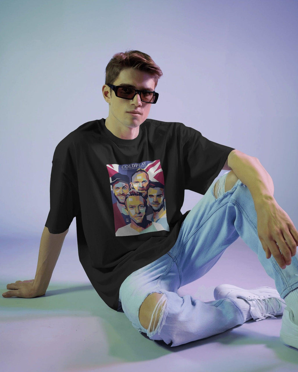 Black t-shirt from Nitorious Atelier featuring a bold Coldplay-inspired graphic print. Made from premium cotton, this t-shirt combines style and comfort, perfect for music lovers.