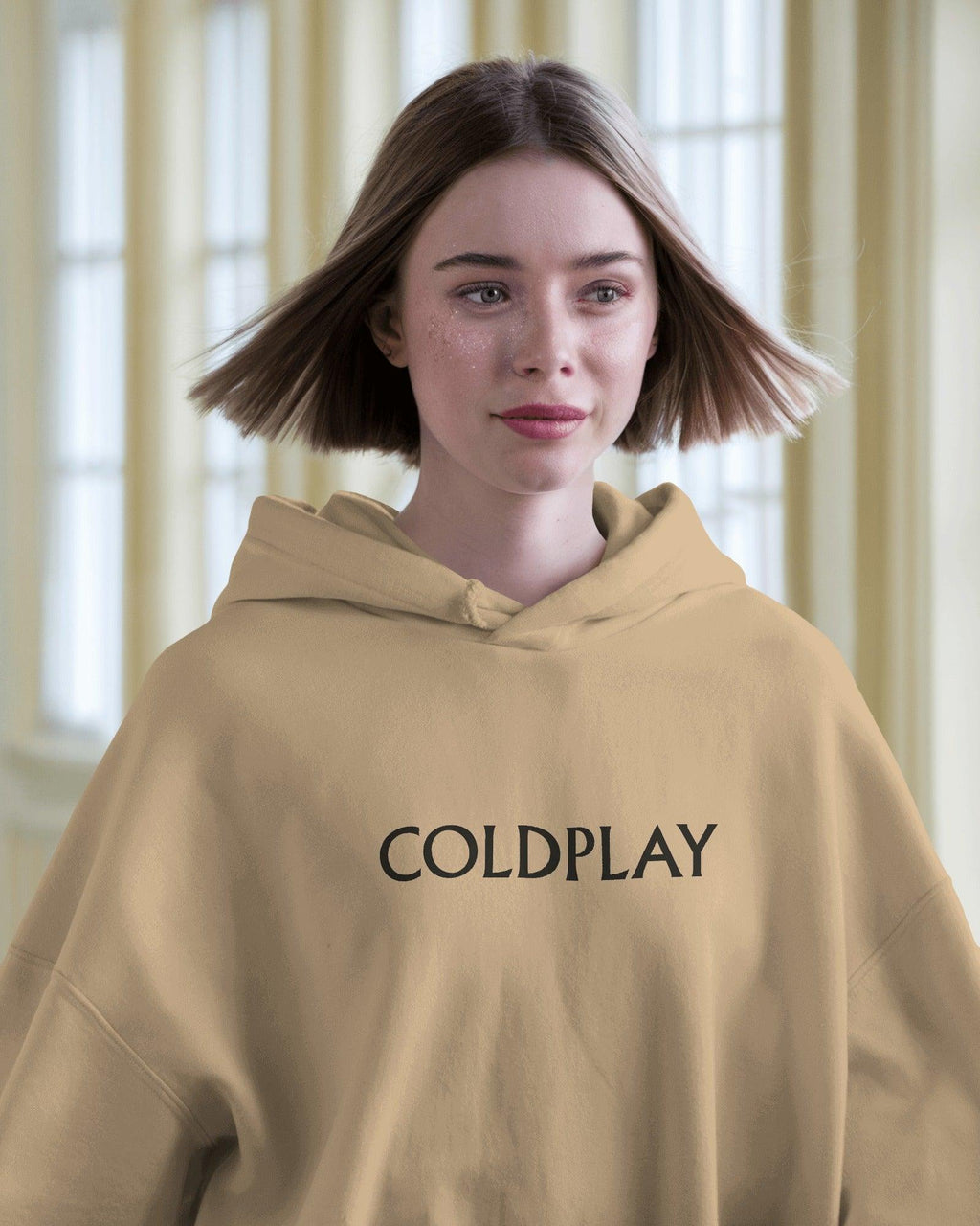 Beige hoodie from Nitorious Atelier featuring a Coldplay-inspired design. Made with 100% premium cotton fleece, this hoodie offers unmatched comfort, warmth, and style for music lovers.