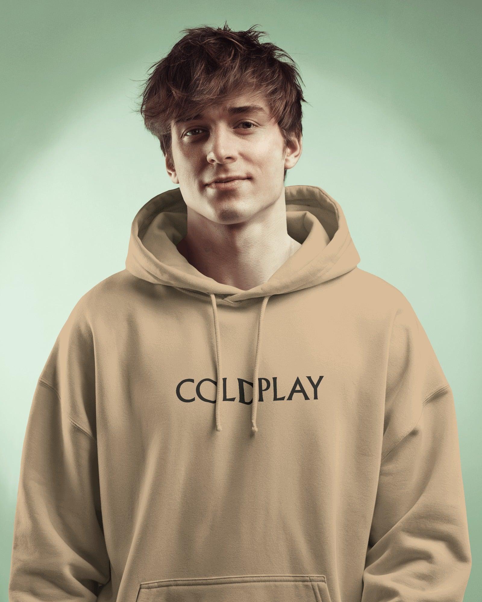 Beige hoodie from Nitorious Atelier featuring a Coldplay-inspired design. Made with 100% premium cotton fleece, this hoodie offers unmatched comfort, warmth, and style for music lovers.