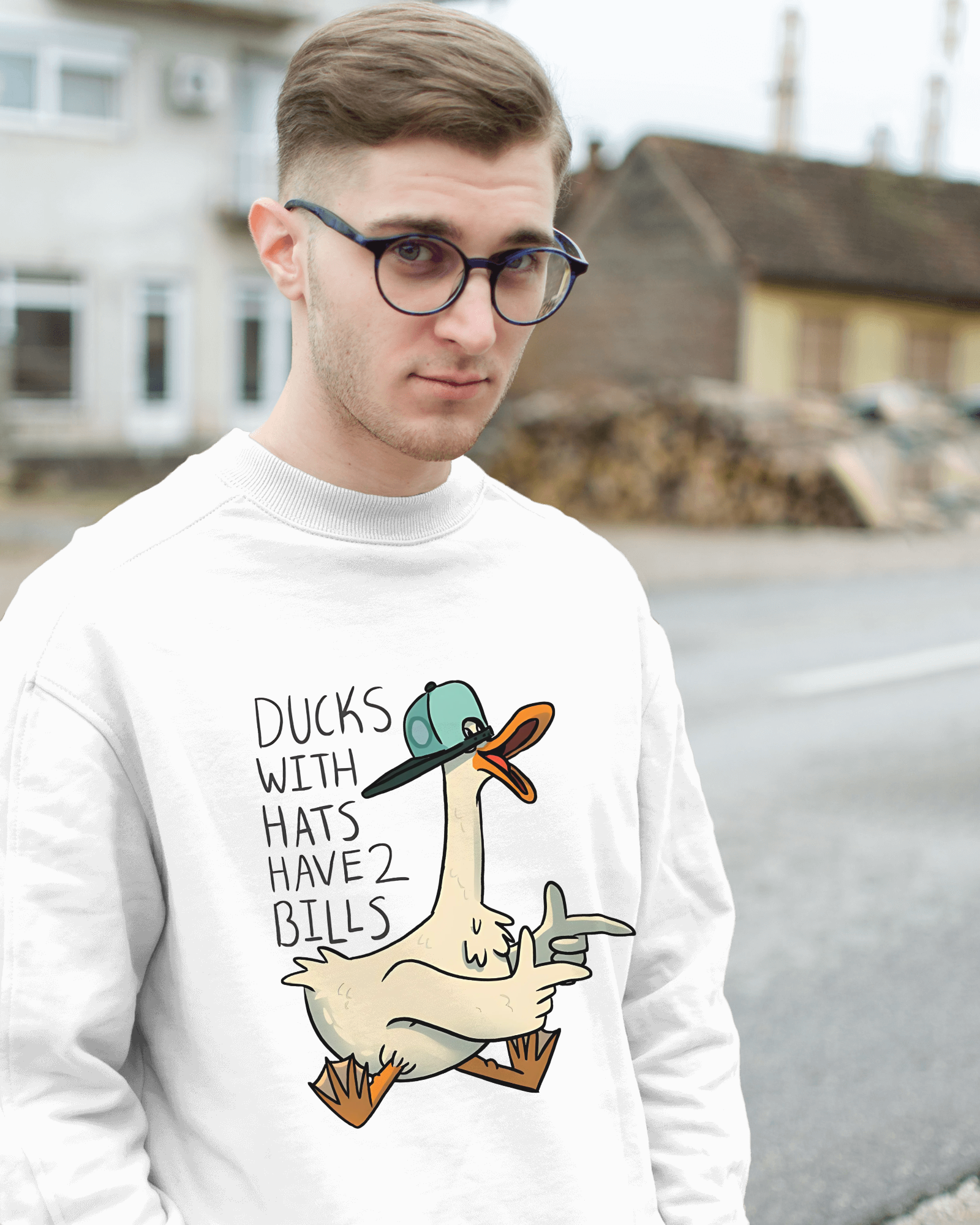 White sweatshirt from Nitorious Atelier featuring a charming duck print on the chest. Made from premium cotton fleece, this sweatshirt offers a cosy and stylish fit for casual wear.