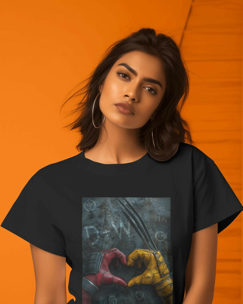 A bold and eye-catching t-shirt showcasing a dynamic graphic of Deadpool and Wolverine in an epic battle. Made from premium cotton fabric, this oversized fit t-shirt combines comfort and style, perfect for fans of Marvel comics and casual wear.