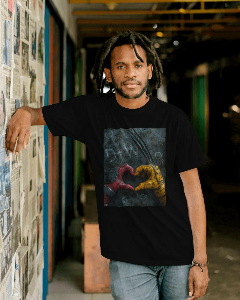 A bold and eye-catching t-shirt showcasing a dynamic graphic of Deadpool and Wolverine in an epic battle. Made from premium cotton fabric, this oversized fit t-shirt combines comfort and style, perfect for fans of Marvel comics and casual wear.