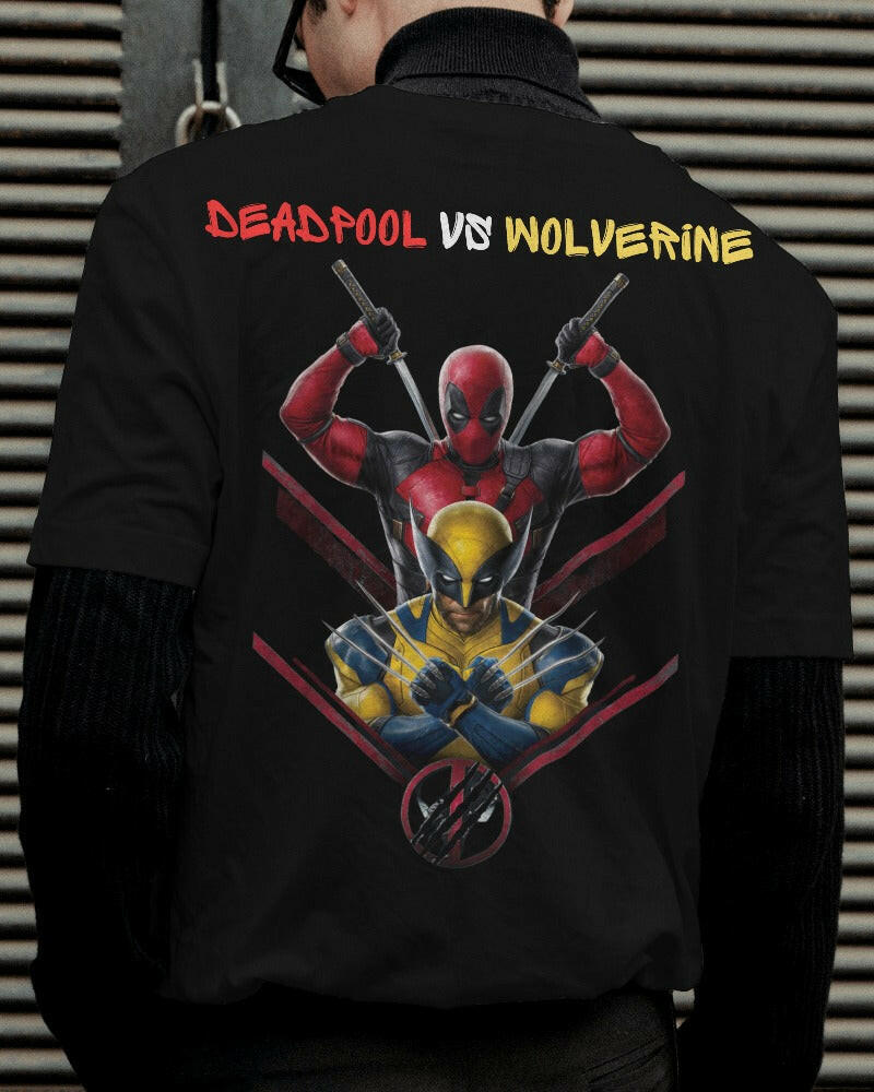 A bold and eye-catching t-shirt showcasing a dynamic graphic of Deadpool and Wolverine in an epic battle. Made from premium cotton fabric, this oversized fit t-shirt combines comfort and style, perfect for fans of Marvel comics and casual wear.