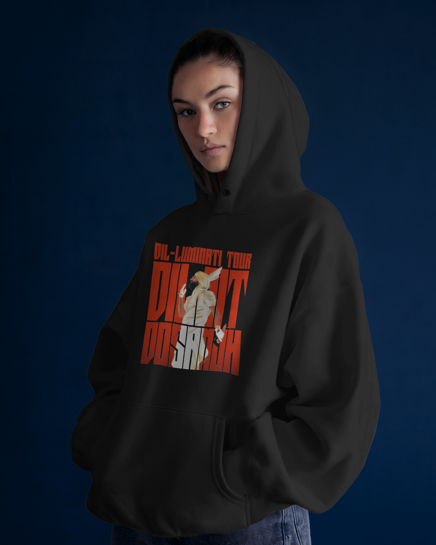 Black Diljit Diluminati hoodie from Nitorious Atelier, showcasing a striking graphic inspired by Diljit Dosanjh. Crafted from 100% premium cotton fleece, this hoodie offers warmth, comfort, and a stylish look for fans who want to stand out.