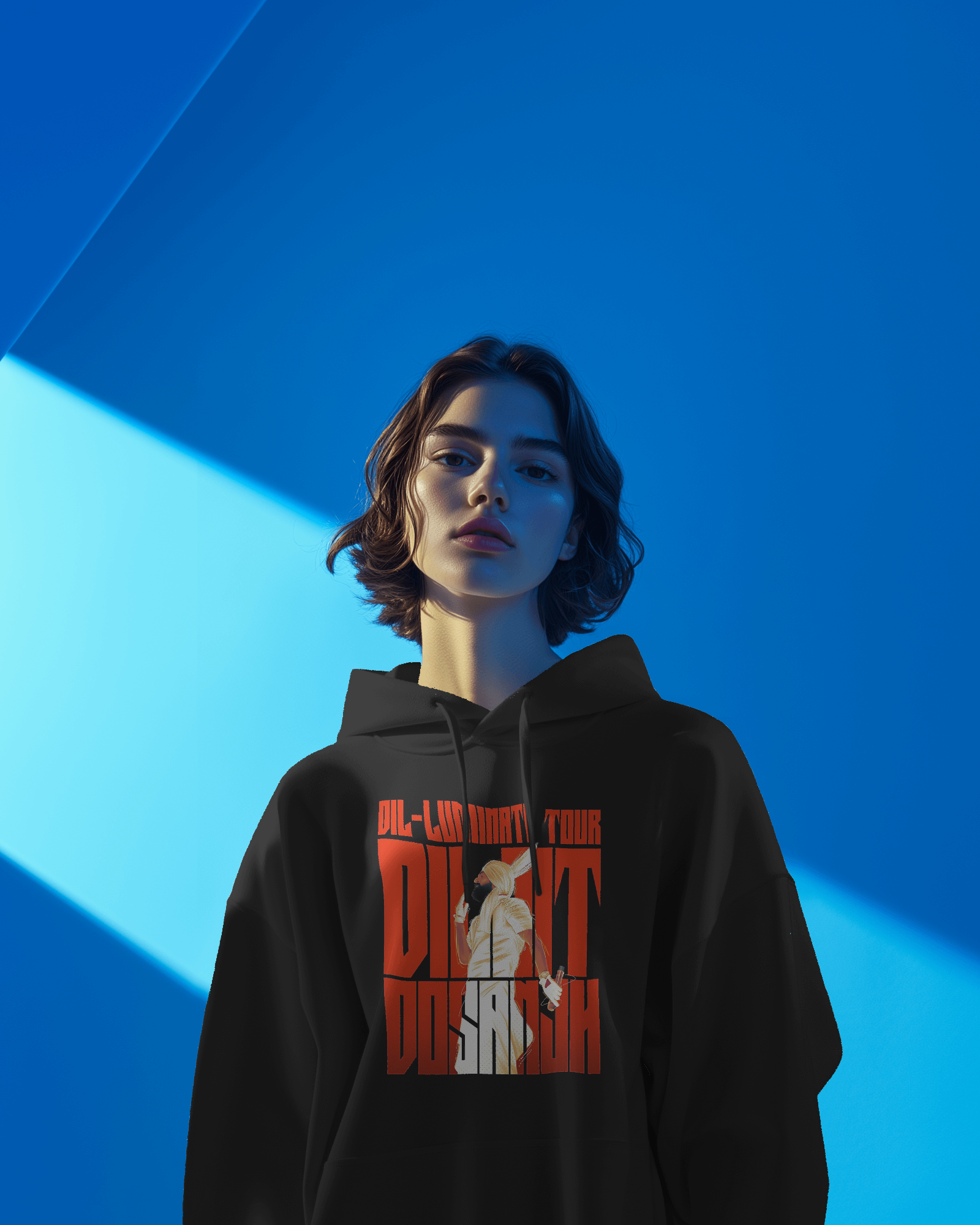 Black Diljit Diluminati hoodie from Nitorious Atelier, showcasing a striking graphic inspired by Diljit Dosanjh. Crafted from 100% premium cotton fleece, this hoodie offers warmth, comfort, and a stylish look for fans who want to stand out.