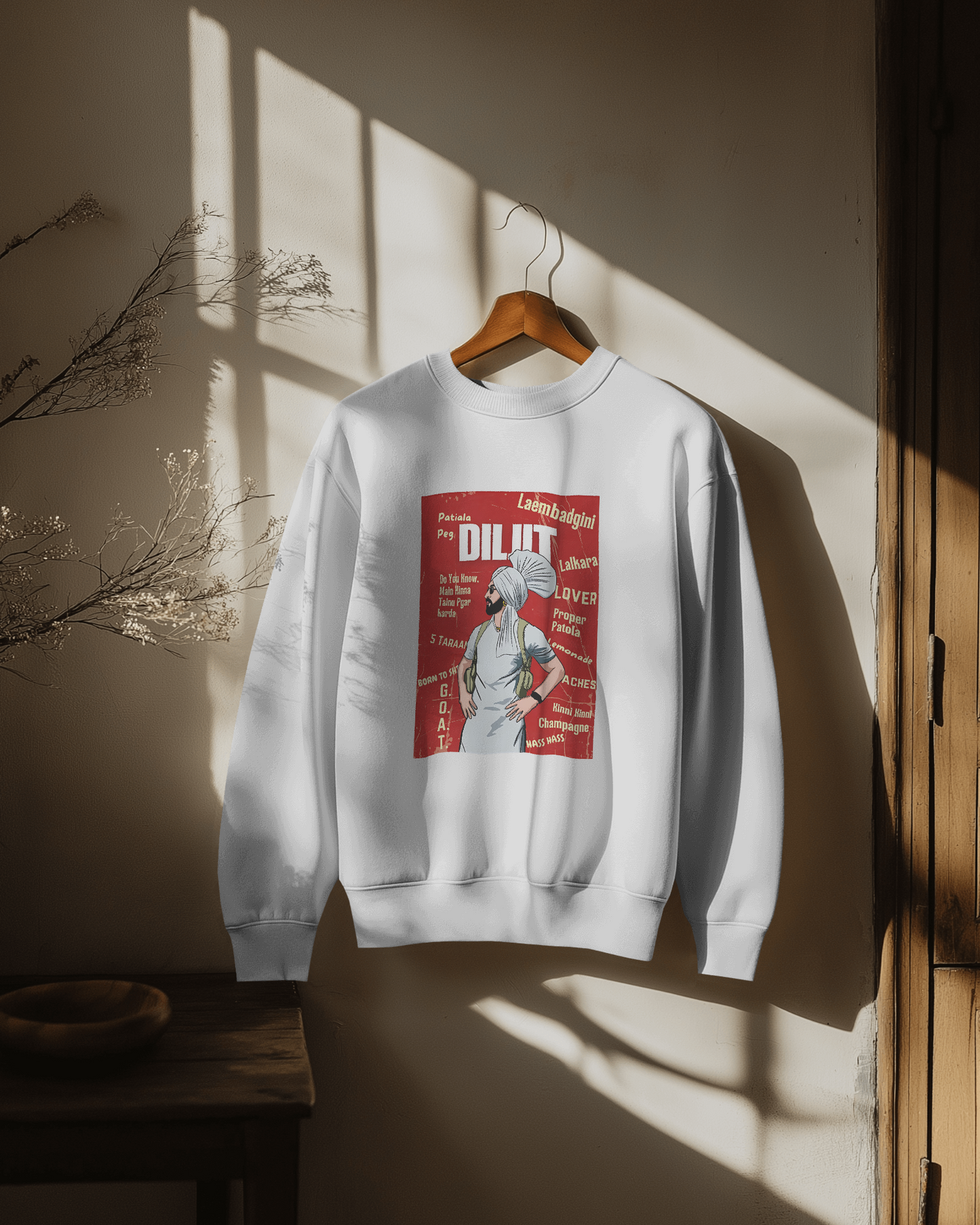 Diljit Dosanjh white sweatshirt featuring a stylish graphic of the Punjabi superstar. Made from premium cotton fleece, this sweatshirt provides warmth, comfort, and a relaxed fit, perfect for casual wear and fans of the iconic artist.