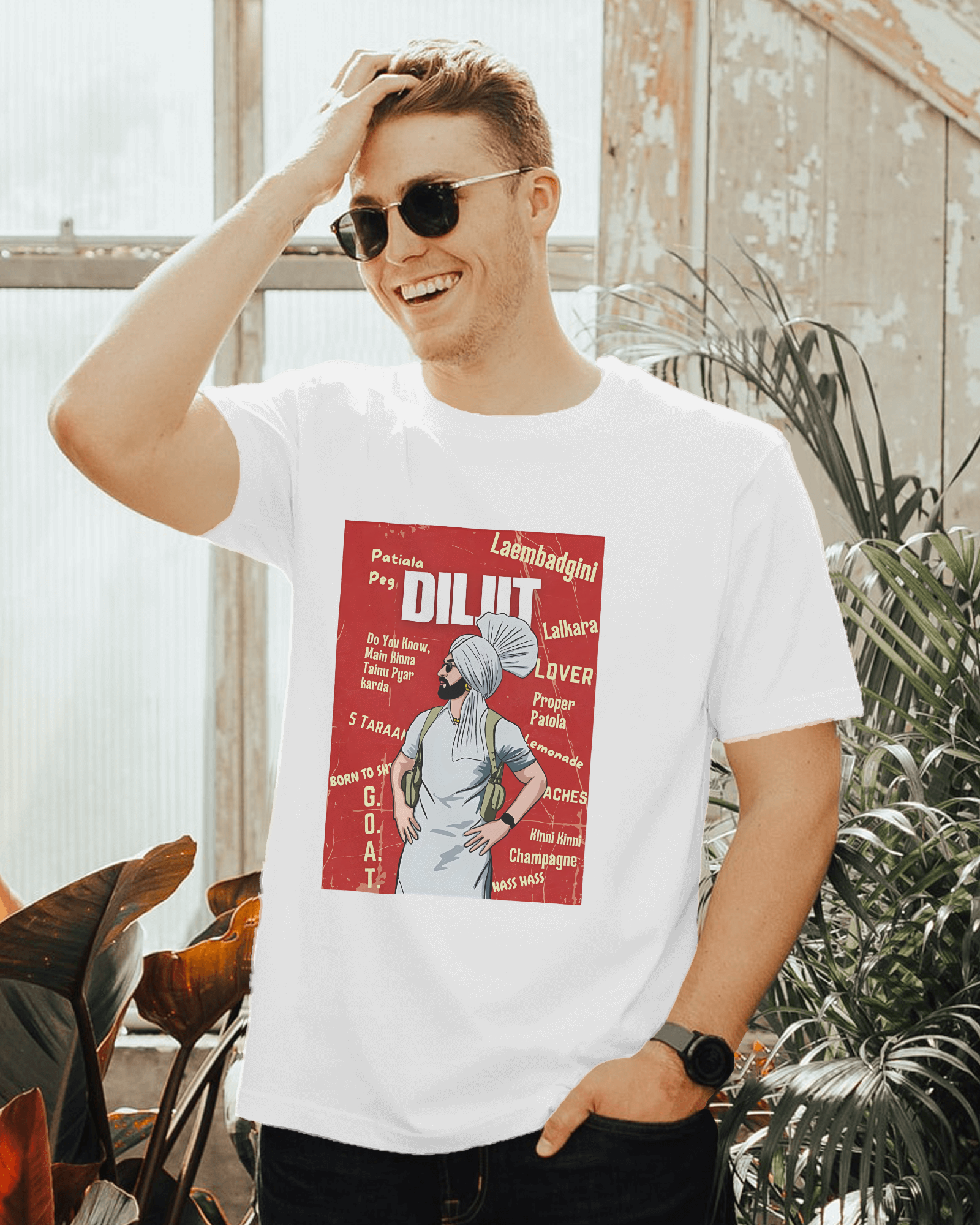 Diljit Dosanjh white t-shirt featuring a vibrant graphic of the iconic Punjabi singer. Made from premium cotton, this t-shirt offers a soft, comfortable fit and is perfect for fans looking to celebrate their favorite artist in style.