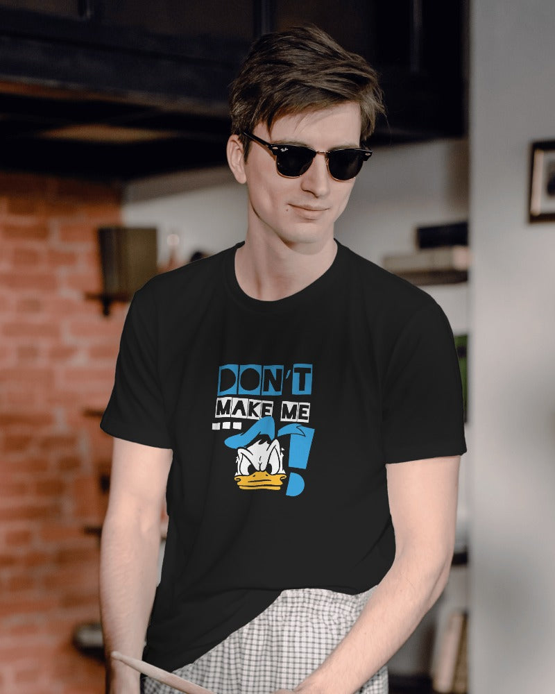 Donald black regular fit t-shirt from Nitorious Atelier. Featuring a vibrant graphic of Donald, this t-shirt is crafted from premium cotton, ensuring both comfort and durability. Perfect for adding a bold, fun element to your casual wardrobe