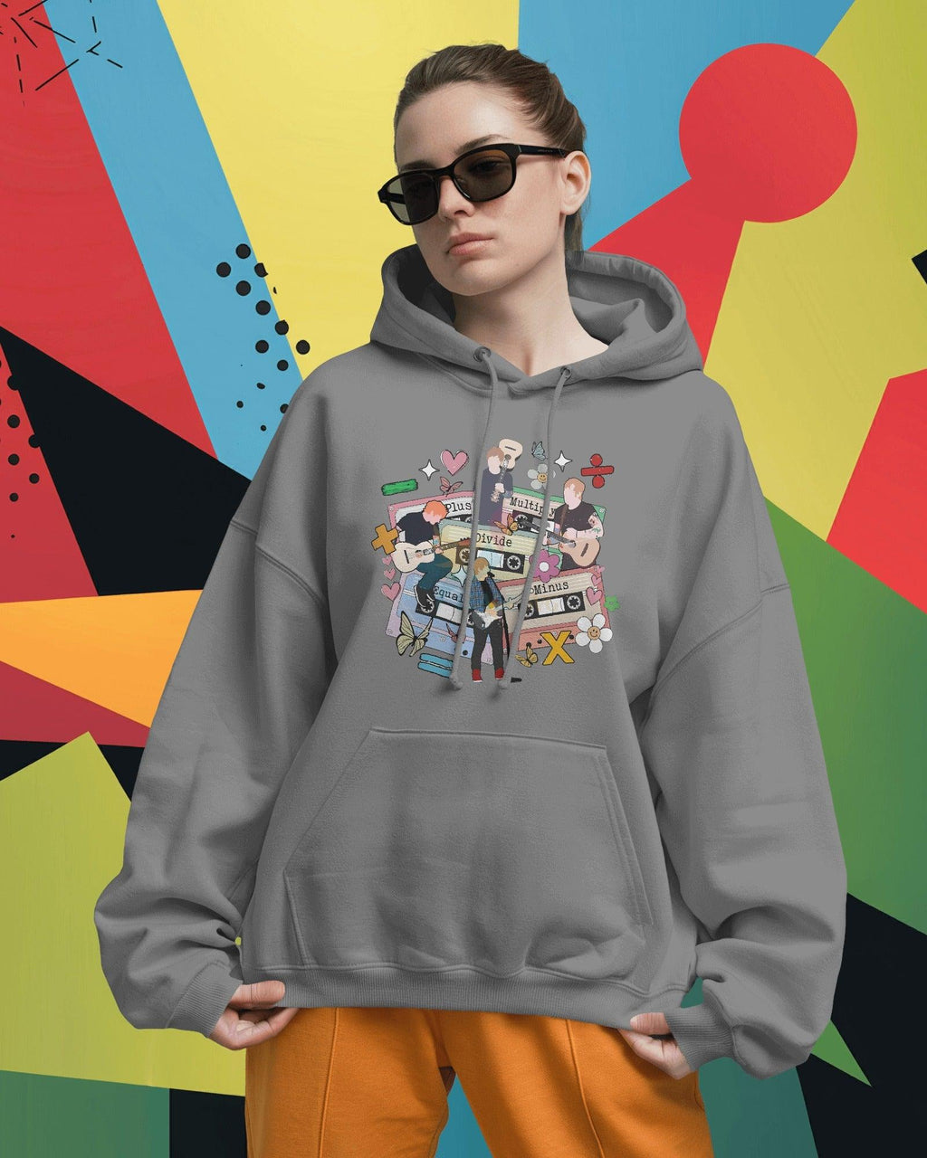 Grey hoodie inspired by Ed Sheeran from Nitorious Atelier, crafted from 100% premium cotton fleece. This comfortable and stylish hoodie features a relaxed fit, soft fabric, and a minimalist design perfect for fans and casual wear.