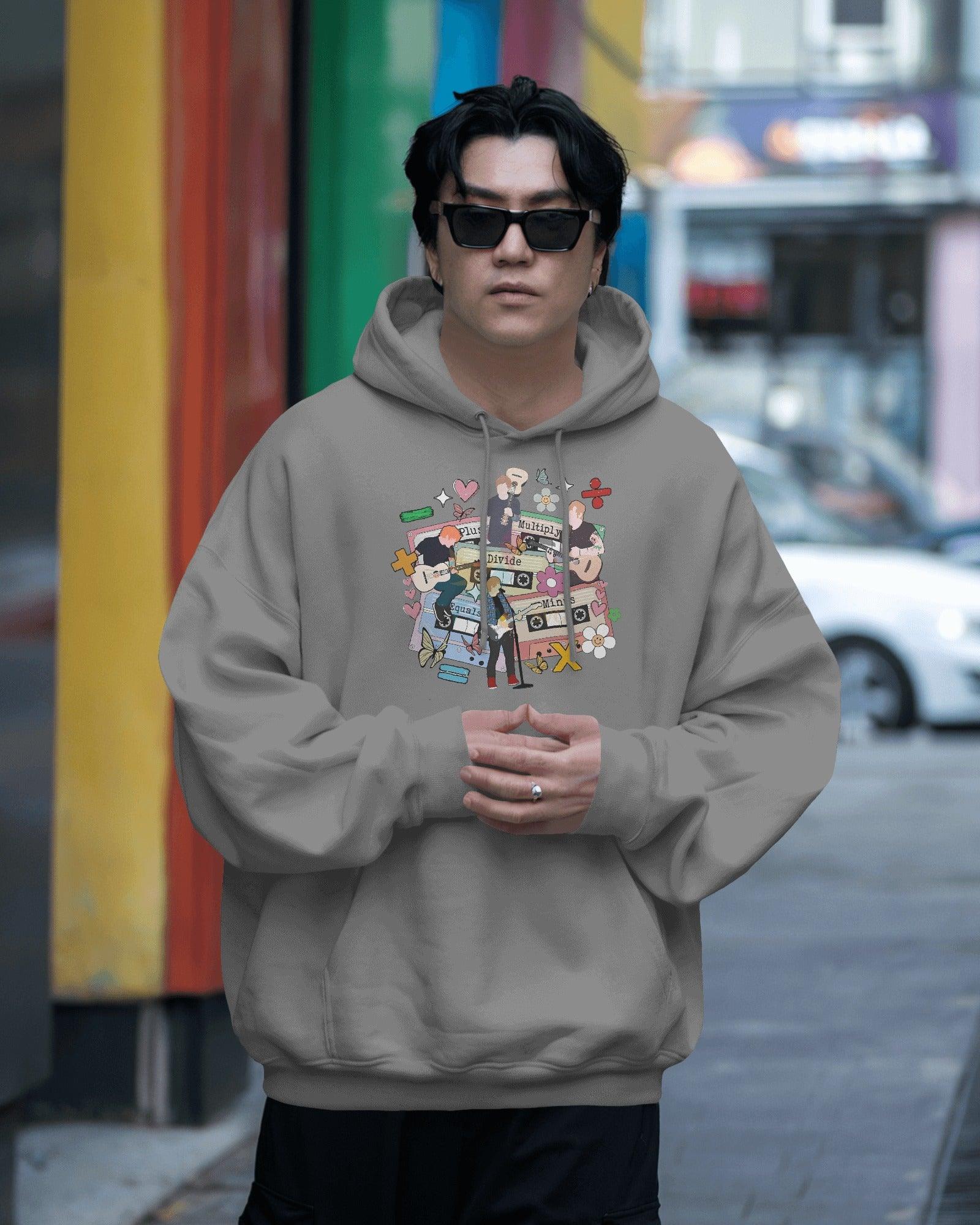 Grey hoodie inspired by Ed Sheeran from Nitorious Atelier, crafted from 100% premium cotton fleece. This comfortable and stylish hoodie features a relaxed fit, soft fabric, and a minimalist design perfect for fans and casual wear.