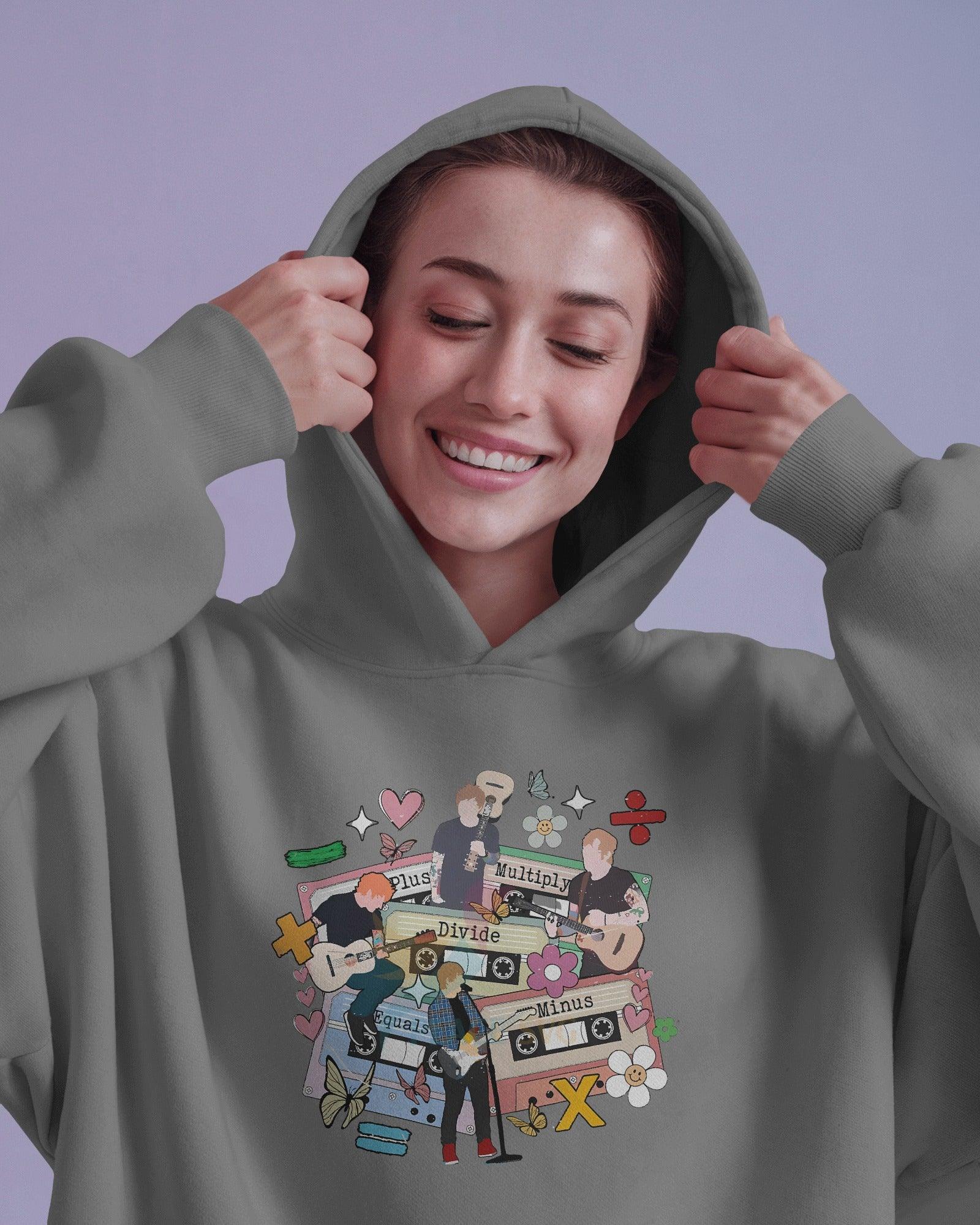 Grey hoodie inspired by Ed Sheeran from Nitorious Atelier, crafted from 100% premium cotton fleece. This comfortable and stylish hoodie features a relaxed fit, soft fabric, and a minimalist design perfect for fans and casual wear.