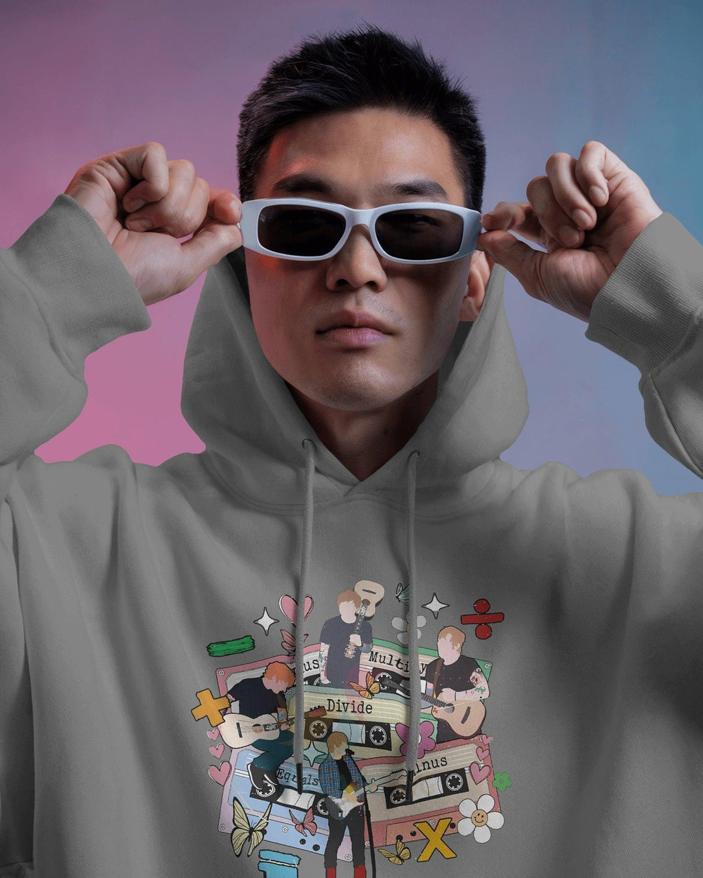 Grey hoodie inspired by Ed Sheeran from Nitorious Atelier, crafted from 100% premium cotton fleece. This comfortable and stylish hoodie features a relaxed fit, soft fabric, and a minimalist design perfect for fans and casual wear.