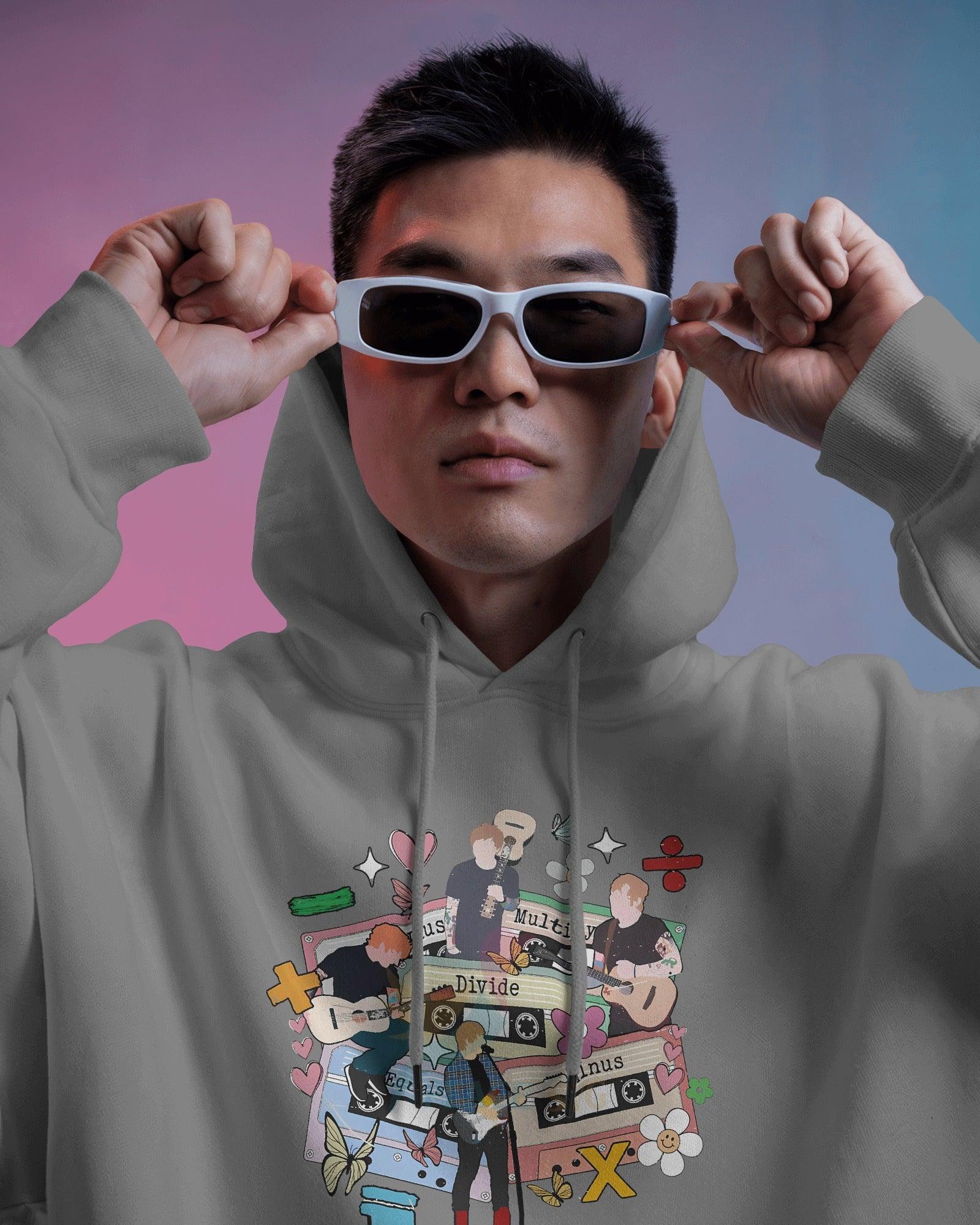 Grey hoodie inspired by Ed Sheeran from Nitorious Atelier, crafted from 100% premium cotton fleece. This comfortable and stylish hoodie features a relaxed fit, soft fabric, and a minimalist design perfect for fans and casual wear.