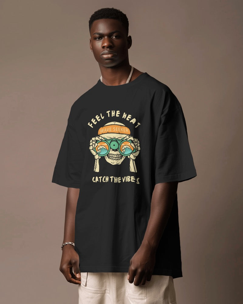 Feel the Heat Oversized Black T-Shirt from Nitorious Atelier. This t-shirt features a bold graphic design and is crafted from premium cotton for maximum comfort and durability. Perfect for making a statement while staying comfortable.