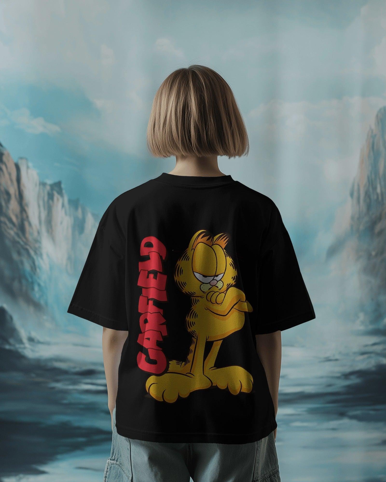 Black oversized t-shirt featuring a bold Garfield graphic print. Made from premium cotton, this t-shirt offers a relaxed fit, soft comfort, and a stylish streetwear vibe.