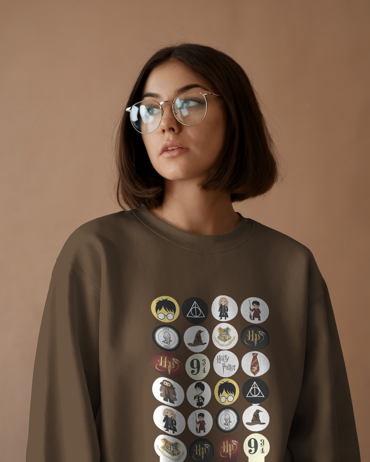 Brown sweatshirt featuring a classic 'Harry Potter' themed design. Crafted from premium fleece fabric, this cosy and stylish sweatshirt is perfect for showcasing your love for magic and adventure while staying warm.