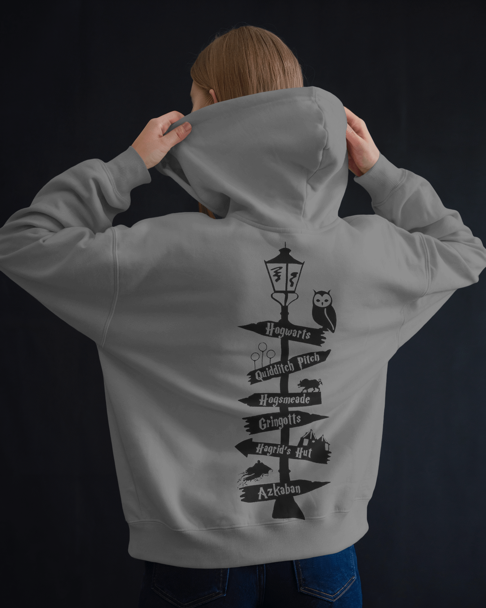 Grey hoodie from Nitorious Atelier featuring a magical, wizard-inspired design. Made from soft, premium cotton fleece, this hoodie offers a cosy fit, perfect for fans of spellbinding adventures and enchanting style.