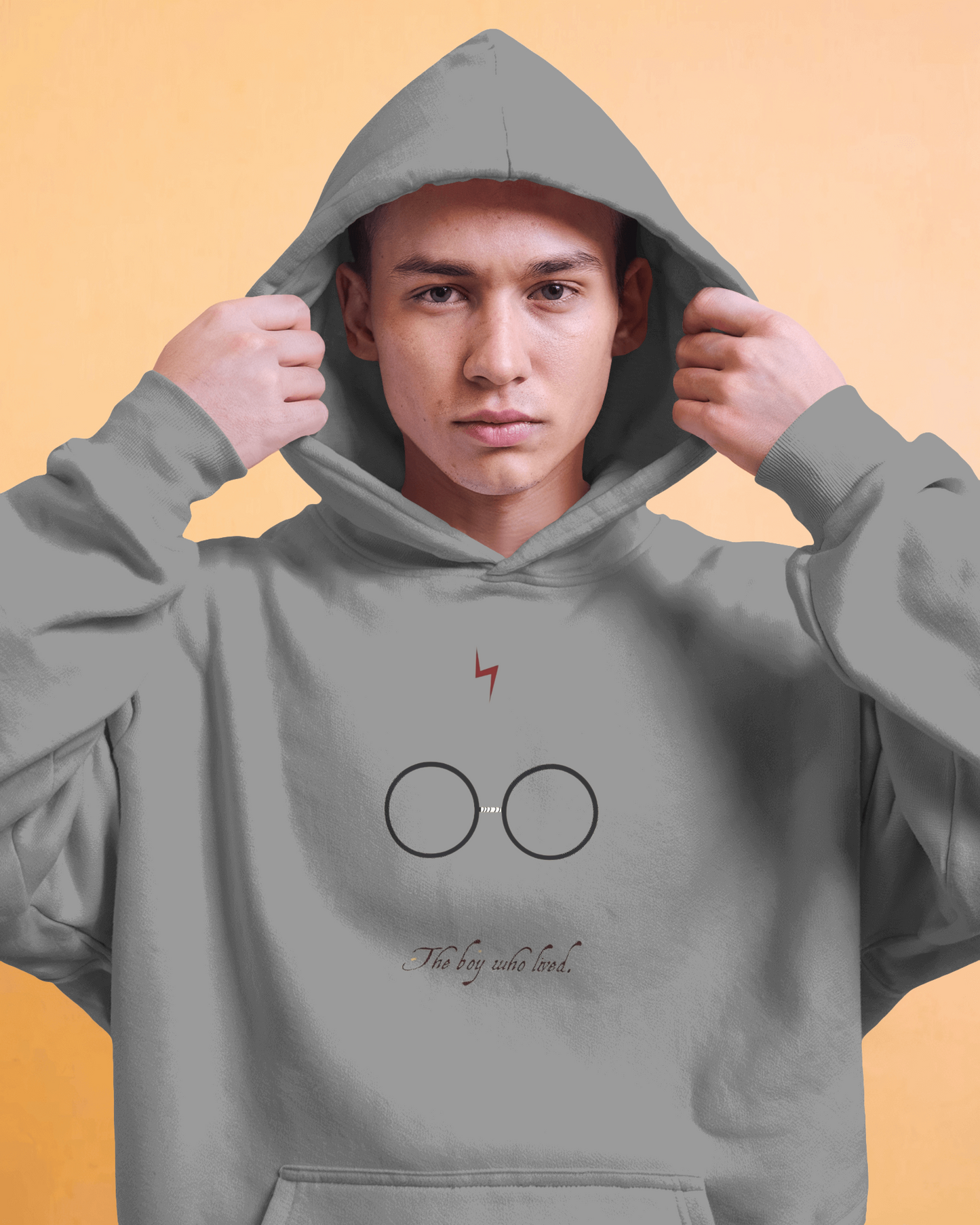 Grey hoodie from Nitorious Atelier featuring a magical, wizard-inspired design. Made from soft, premium cotton fleece, this hoodie offers a cosy fit, perfect for fans of spellbinding adventures and enchanting style.