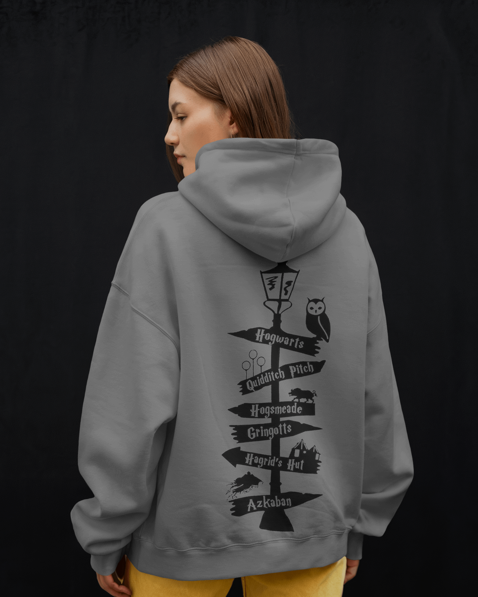 Grey hoodie from Nitorious Atelier featuring a magical, wizard-inspired design. Made from soft, premium cotton fleece, this hoodie offers a cosy fit, perfect for fans of spellbinding adventures and enchanting style.