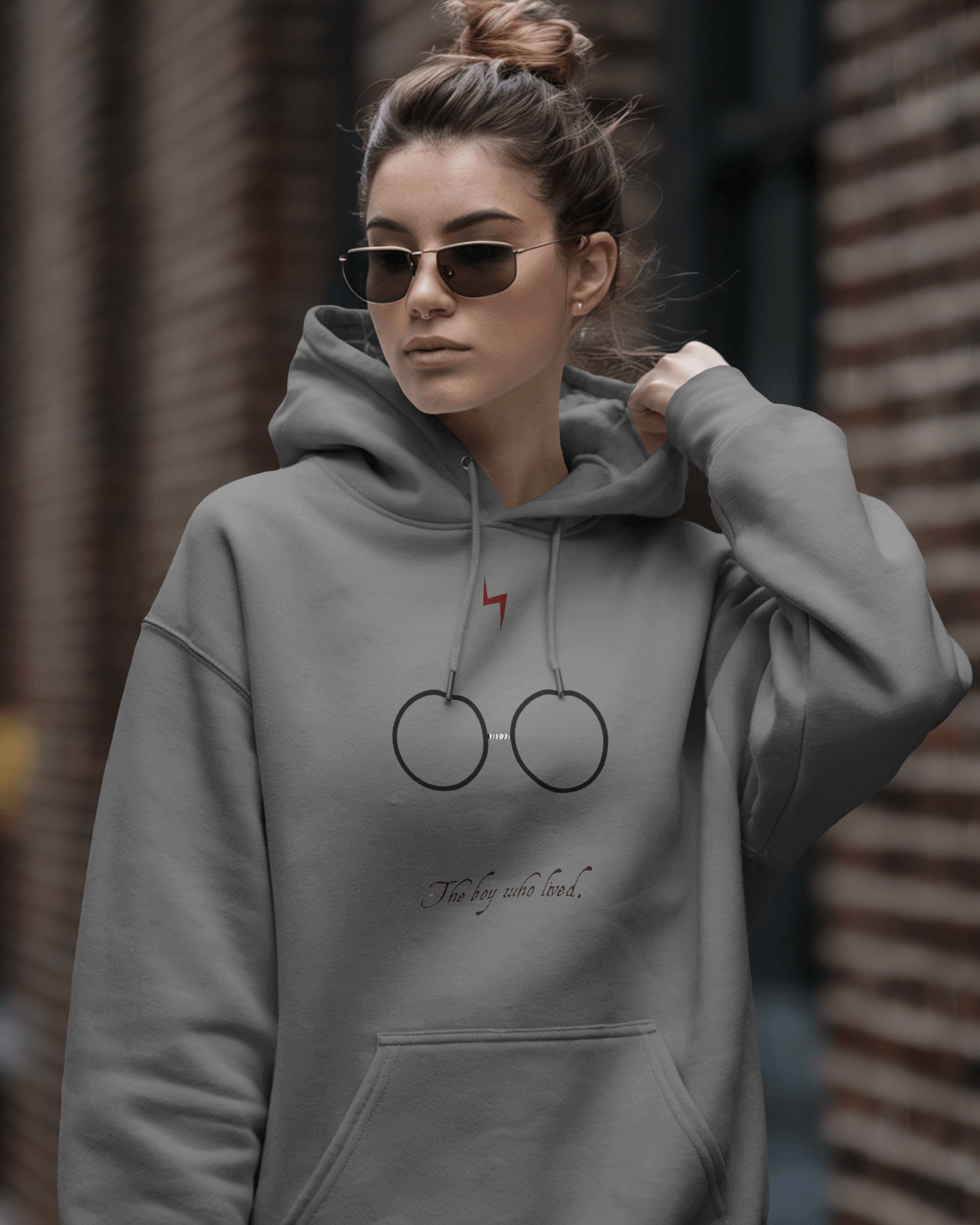 Grey hoodie from Nitorious Atelier featuring a magical, wizard-inspired design. Made from soft, premium cotton fleece, this hoodie offers a cosy fit, perfect for fans of spellbinding adventures and enchanting style.