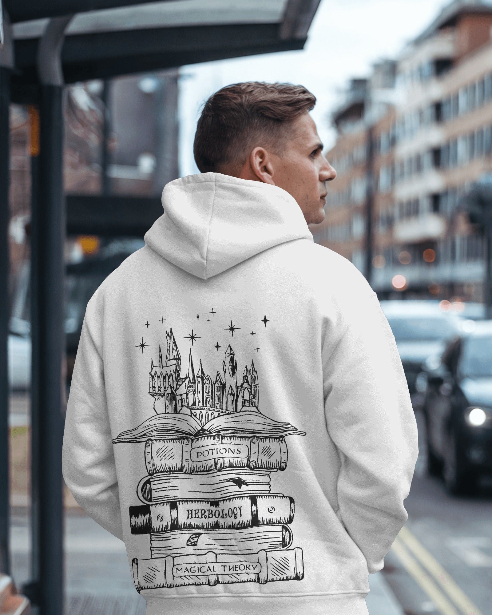 White hoodie featuring a Harry Potter-inspired design from Nitorious Atelier. Made from 100% premium cotton fleece, this hoodie offers a cosy fit, perfect for fans of the Wizarding World who value comfort and style.