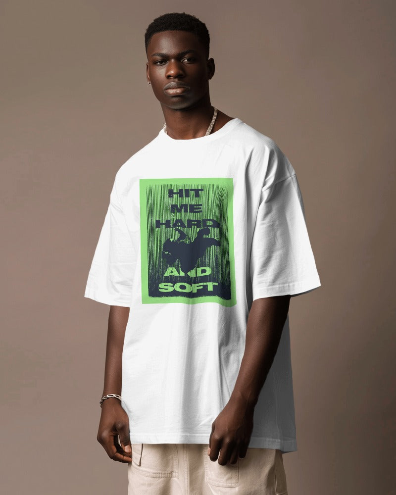 White oversized t-shirt from Nitorious Atelier featuring a Billie Eilish "Hit Me Hard and Soft" graphic. Made from premium cotton, this t-shirt combines a bold design with ultimate comfort for all Billie Eilish fans.