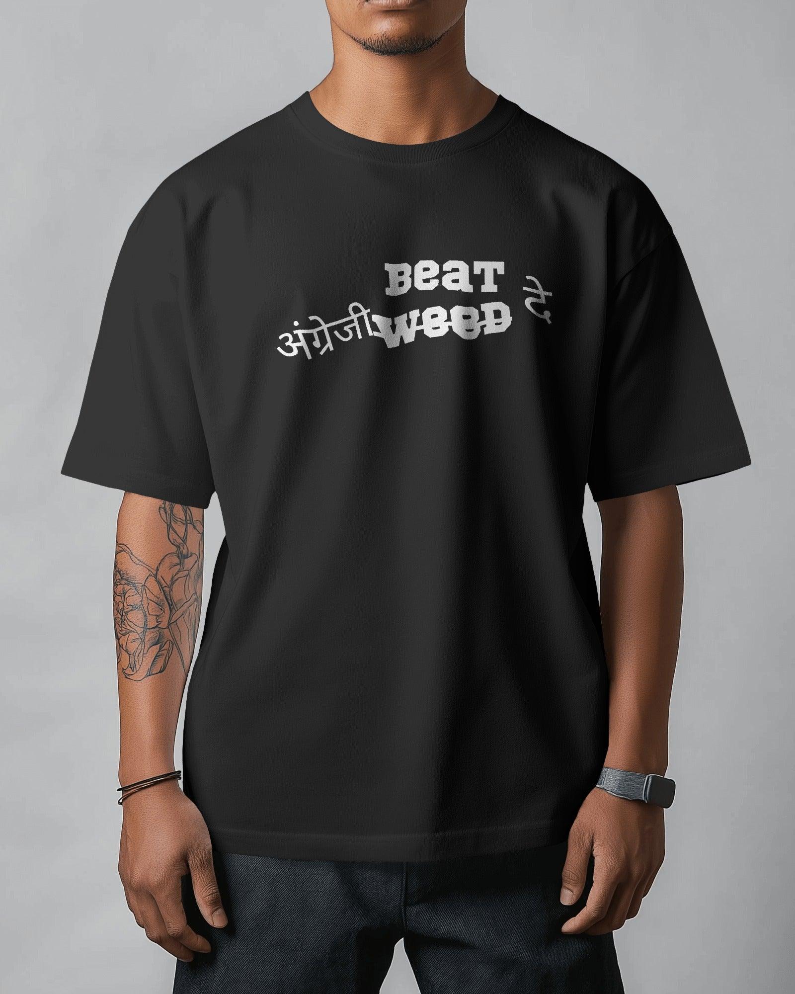 Black oversized t-shirt from Nitorious Atelier featuring a bold 'Angreji Beat' graphic inspired by Honey Singh. Made from premium 220 GSM cotton, this tee offers a soft feel, durable print, and a relaxed fit for ultimate comfort and style