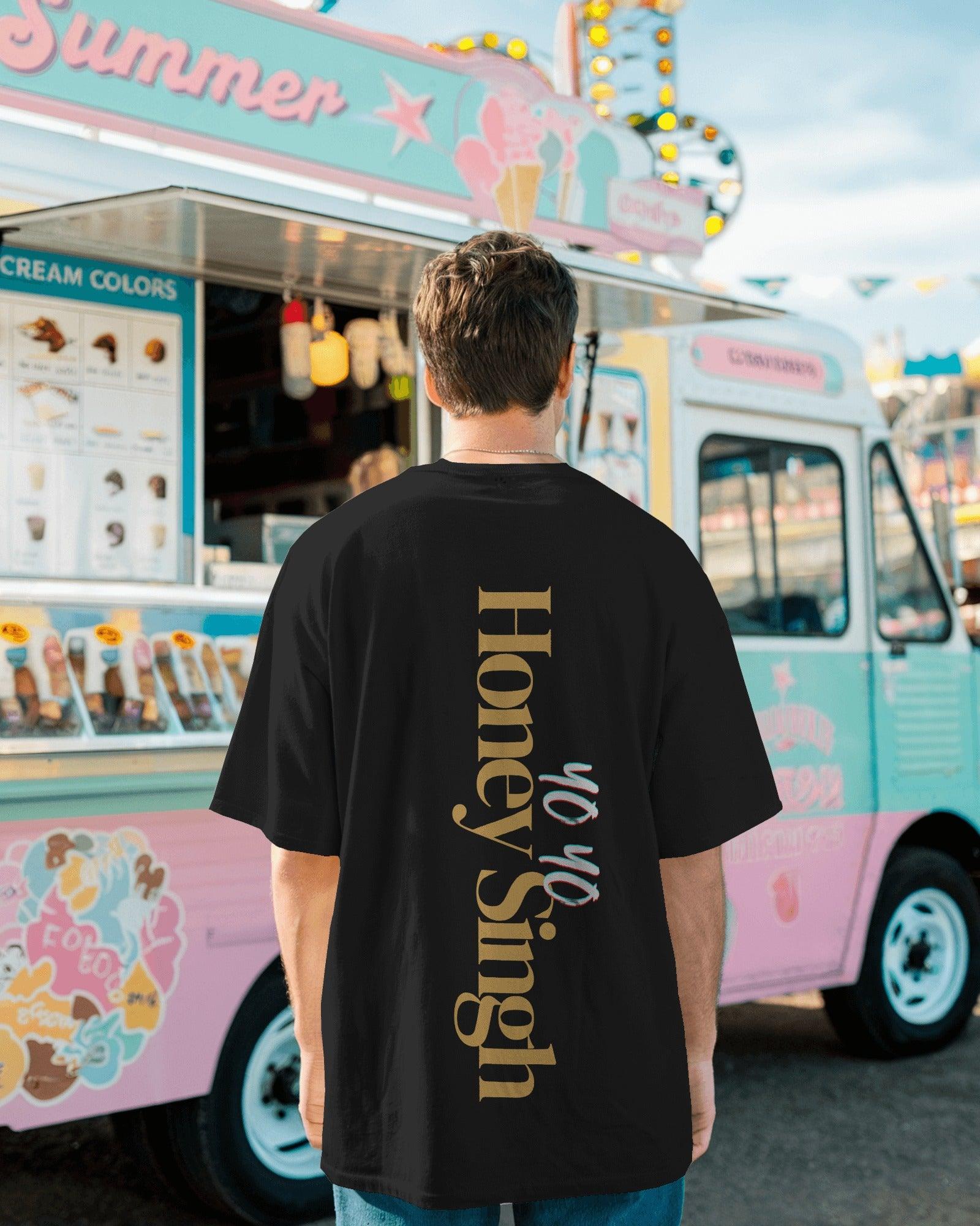 Black oversized t-shirt from Nitorious Atelier featuring the "Honey Singh Million Tour" graphic print. Made from premium cotton, this t-shirt offers a soft feel, durable fabric, and a relaxed fit for ultimate comfort and style.
