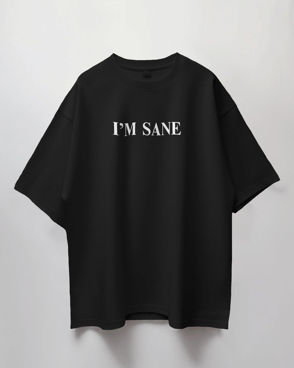 Oversized ‘I Am Sane and I’m Insane’ t-shirt from Nitorious Atelier. Bold, unfiltered, and full of contradictions—crafted from premium 220 GSM cotton for ultimate comfort and an eye-catching statement look