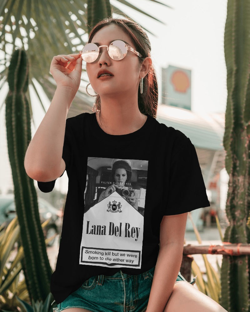 Black t-shirt featuring a bold graphic of Lana Del Rey from Nitorious Atelier. Crafted from premium cotton, this t-shirt ensures a comfortable fit and a stylish tribute to the iconic singer.