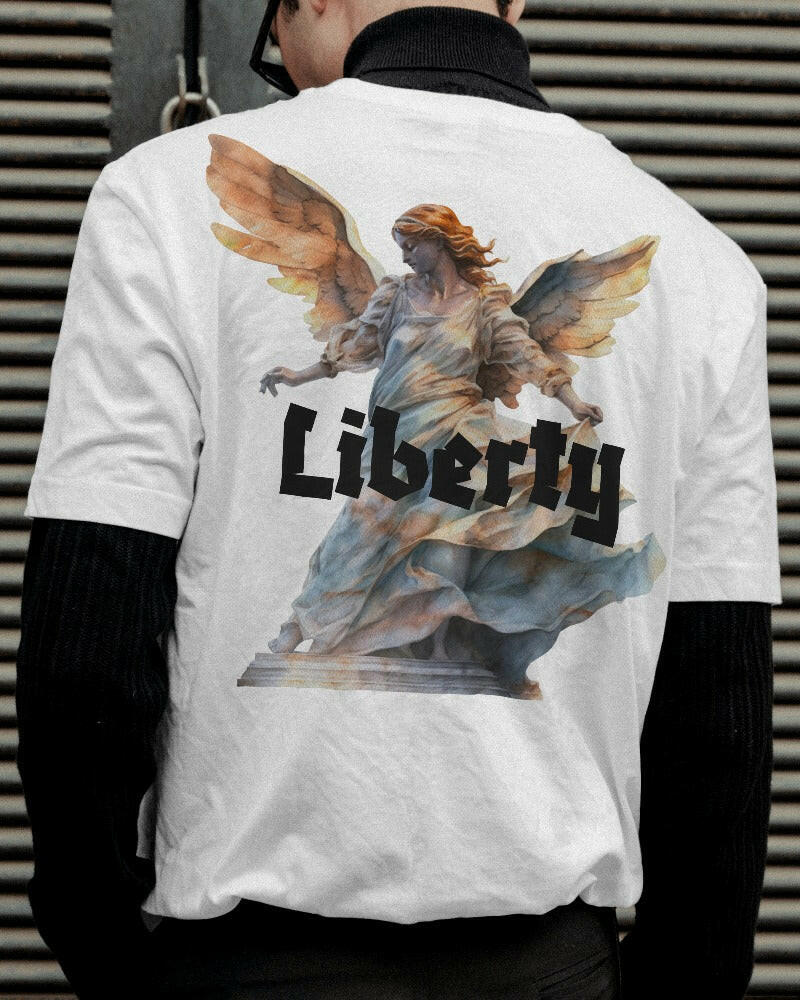  A striking t-shirt featuring a detailed and artistic graphic of the Liberty. Made from premium cotton fabric, this oversized fit t-shirt offers both comfort and a statement-making style, perfect for casual wear and expressing your love for iconic symbols.