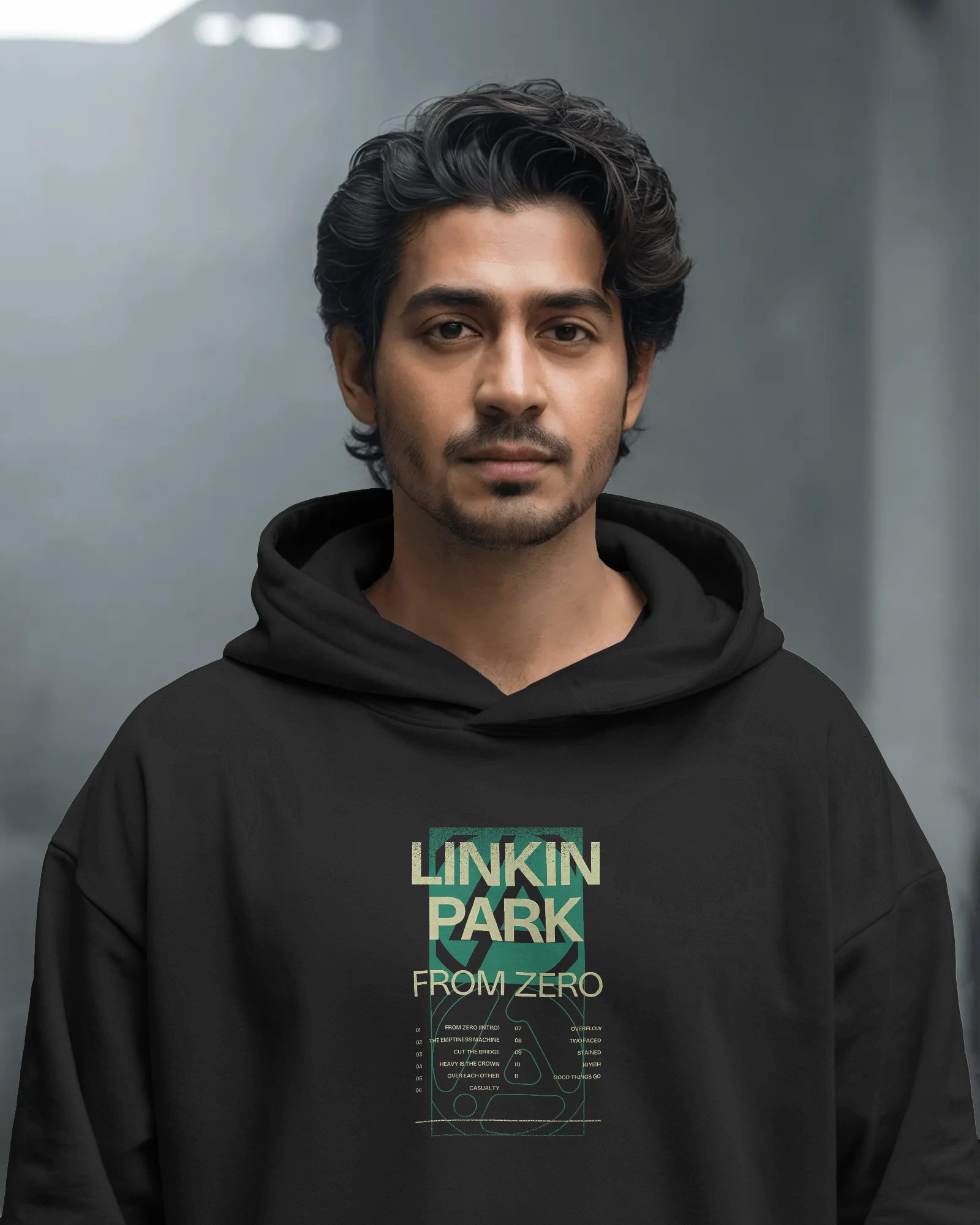 Model wearing Nitorious Atelier Linkin Park From Zero Black Luxe Hoodie with bold graphic print on front and back.