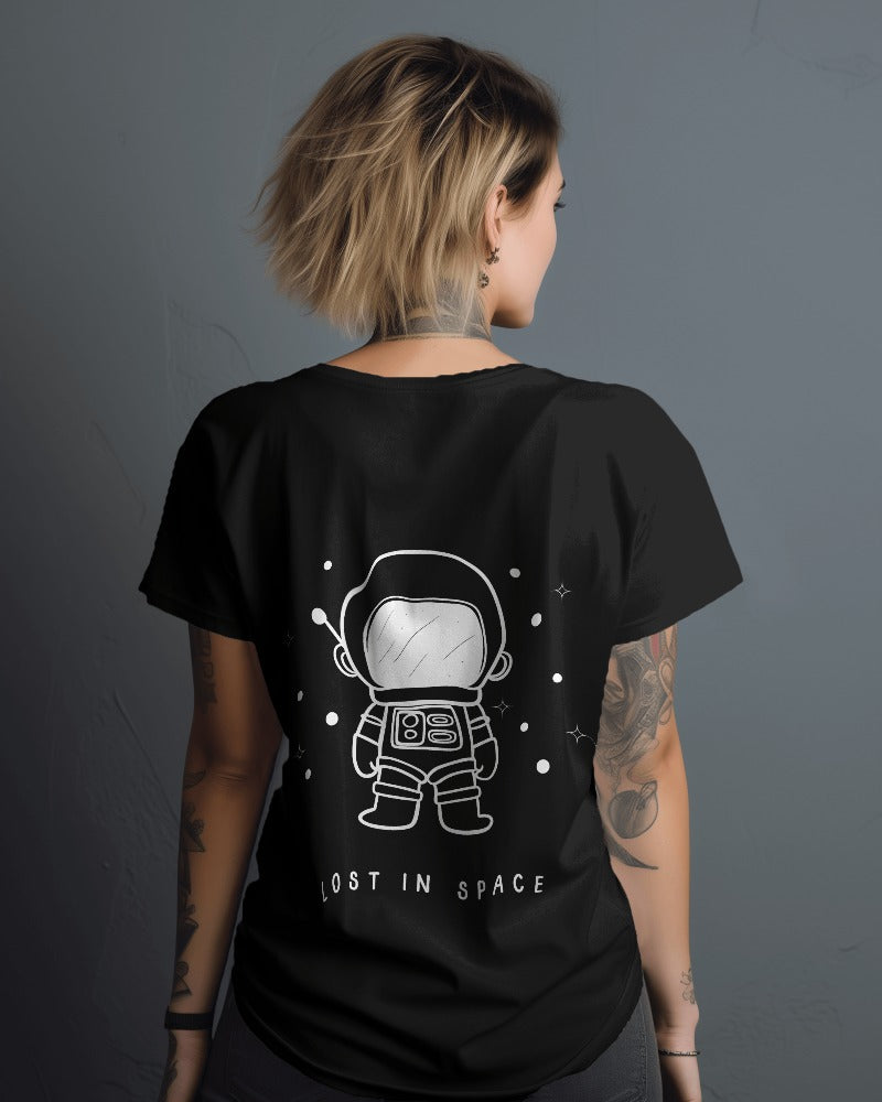 Lost in Space Oversized Black T-Shirt from Nitorious Atelier. Featuring a captivating space-themed graphic, this t-shirt is crafted from premium cotton for a soft, durable, and comfortable fit. Perfect for those who love exploring the cosmos through fashion.