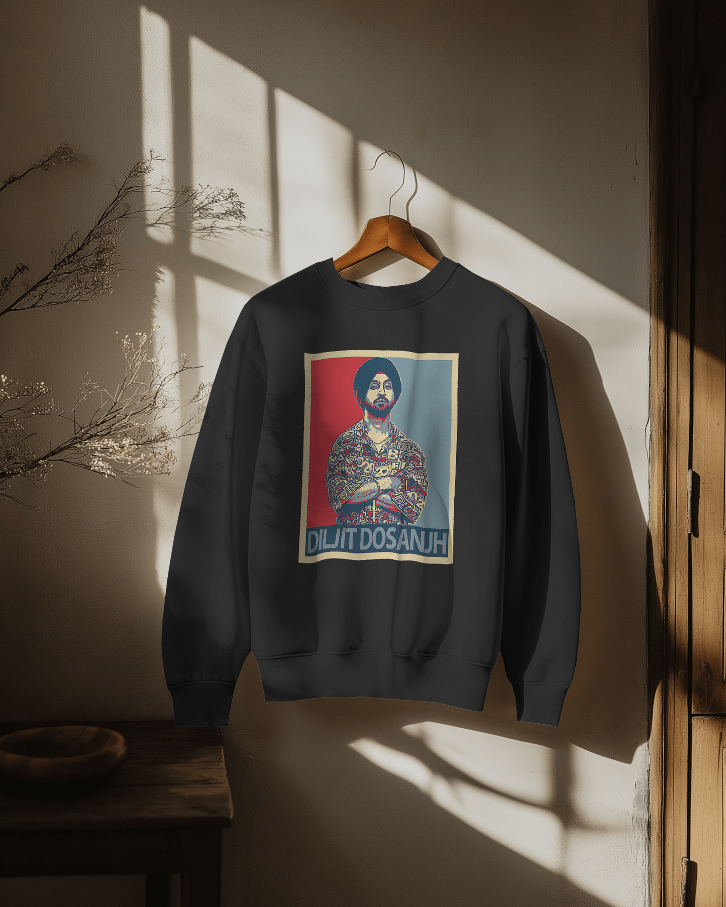 Diljit Dosanjh black sweatshirt featuring a bold graphic of the Punjabi music icon. Made from high-quality cotton fleece, this sweatshirt delivers warmth, comfort, and a stylish fit, perfect for fans wanting to represent their favorite artist in cooler weather.