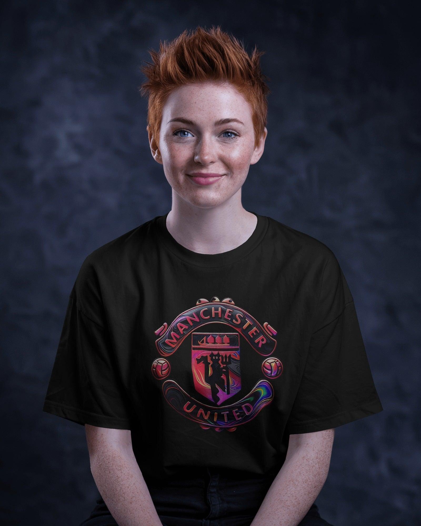 Black oversized t-shirt featuring a bold Manchester graphic print. Made from premium cotton, this t-shirt offers a relaxed fit, soft comfort, and a stylish streetwear aesthetic.