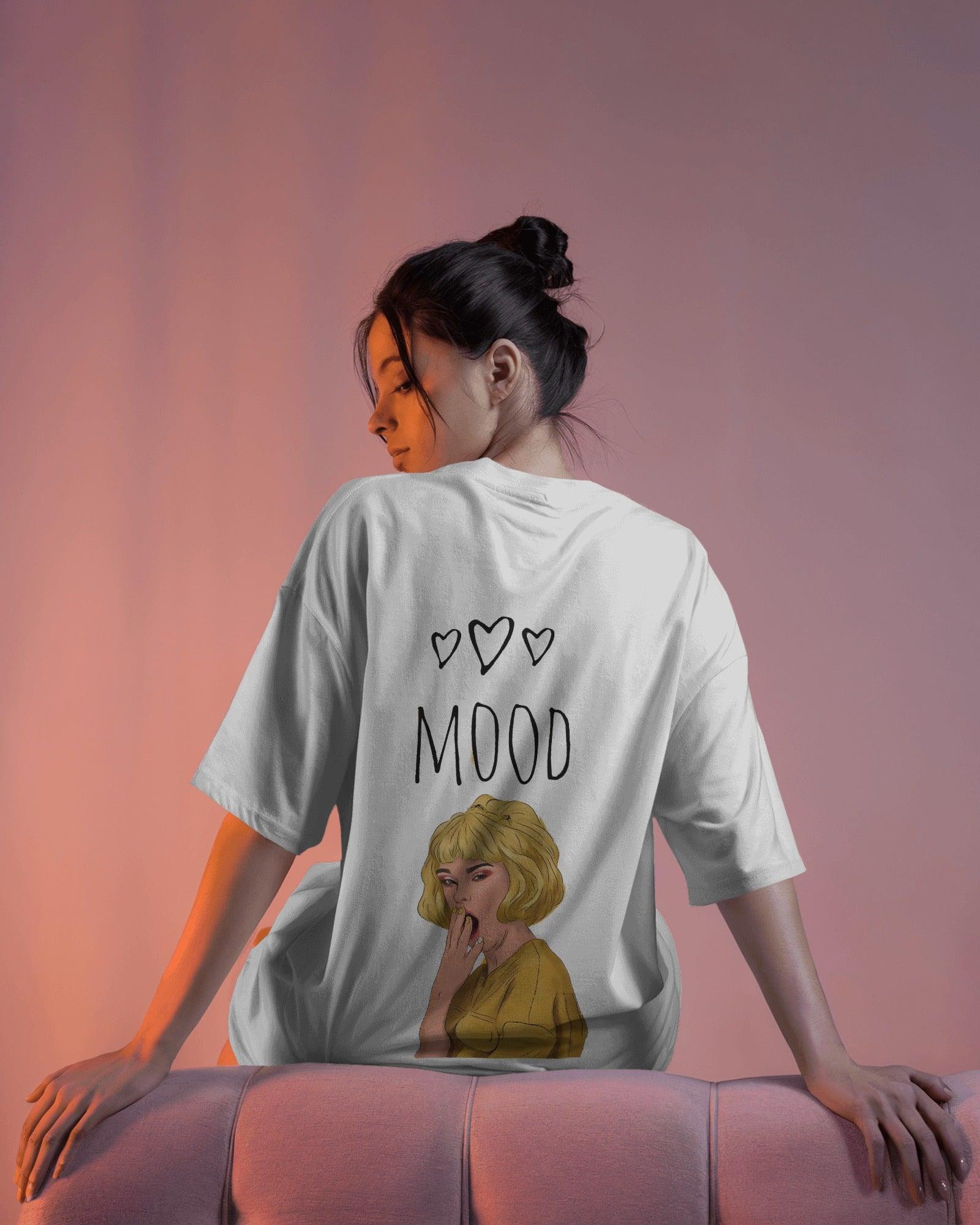 Oversized white t-shirt for women featuring the bold text "Moody But Make It Funky" in a stylish, playful font. Made from premium cotton, this t-shirt offers a relaxed fit for all-day comfort. Perfect for casual wear, the design adds a fun and expressive touch to any outfit.