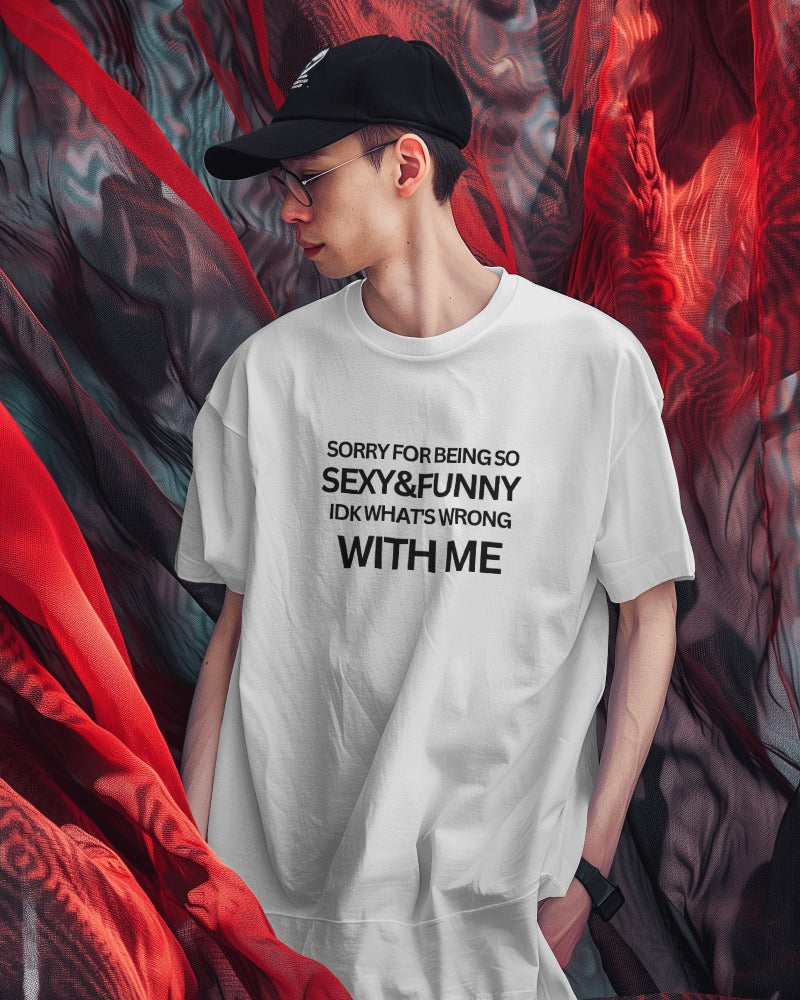 Casual t-shirt from Nitorious Atelier featuring a playful text print that reads, 'Sorry for being so sexy and funny, IDK what's wrong with me.' Made from soft  cotton, this t-shirt adds humor and confidence to your wardrobe.