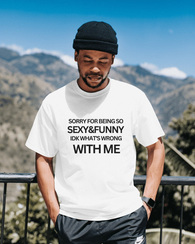 Casual t-shirt from Notorious Atelier featuring a playful text print that reads, 'Sorry for being so sexy and funny, IDK what's wrong with me.' Made from soft cotton, this t-shirt adds humor and confidence to your wardrobe.