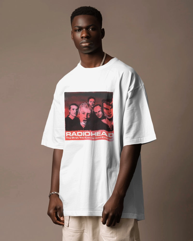 White oversized t-shirt from Nitorious Atelier featuring a bold Radiohead graphic. Made from premium cotton, this t-shirt offers a comfortable and stylish fit perfect for fans of the iconic band.