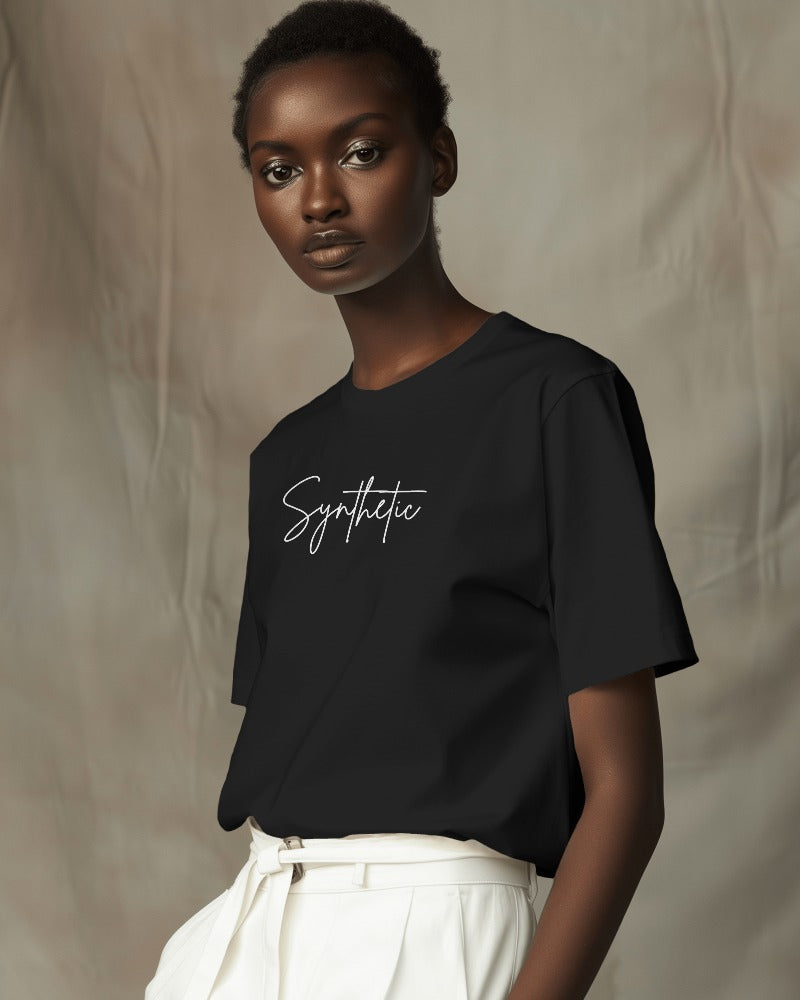 Synthetic Print Oversized Black T-Shirt from Nitorious Atelier. This t-shirt features a unique and eye-catching synthetic graphic print, made from premium cotton for superior comfort, durability, and style. Ideal for a bold and modern look.