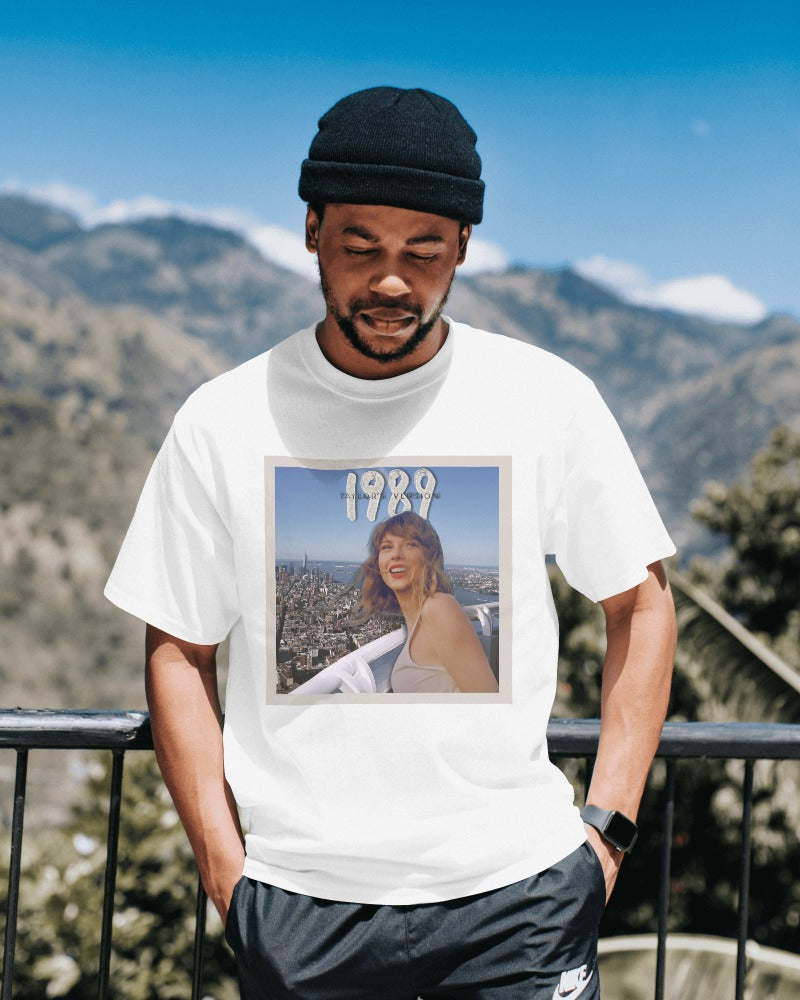 Oversized white t-shirt from Notorious Atelier featuring a bold Taylor Swift graphic. Made from premium cotton, this t-shirt offers a relaxed fit and a stylish tribute to the iconic singer, perfect for fans and casual wear.